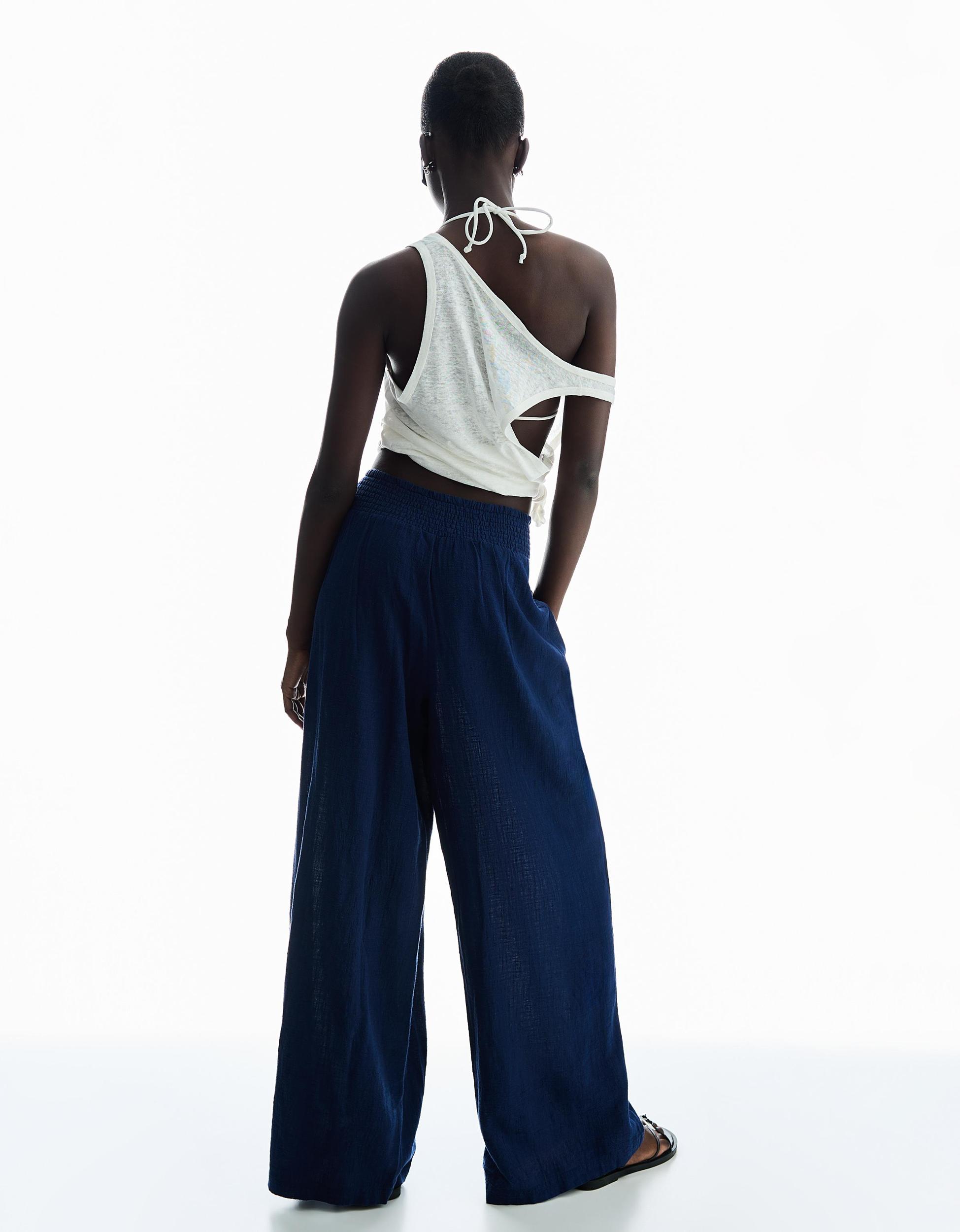 Rustic wide-leg pants with darts Product Image