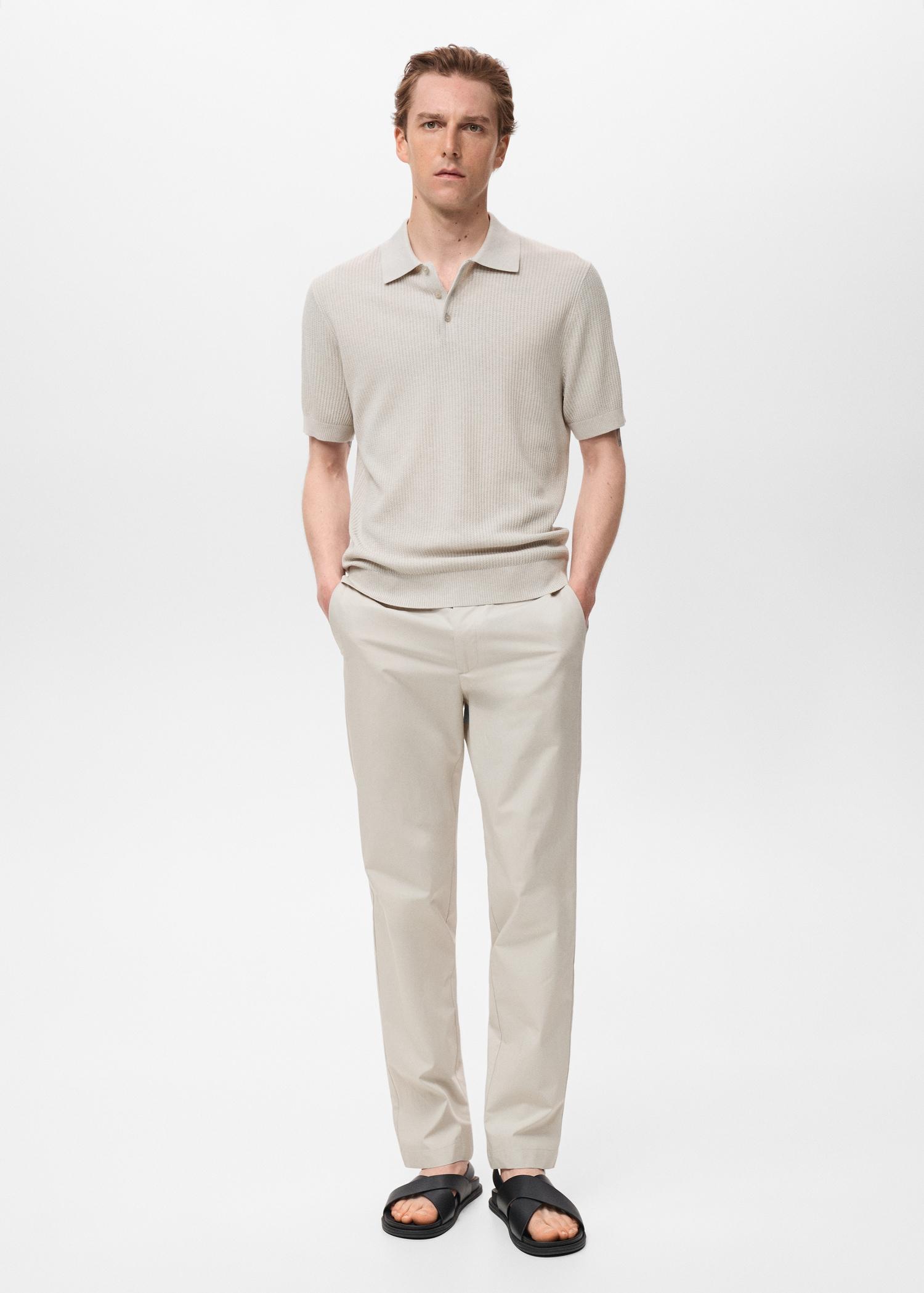 Ribbed knit polo shirt - Men | MANGO USA Product Image
