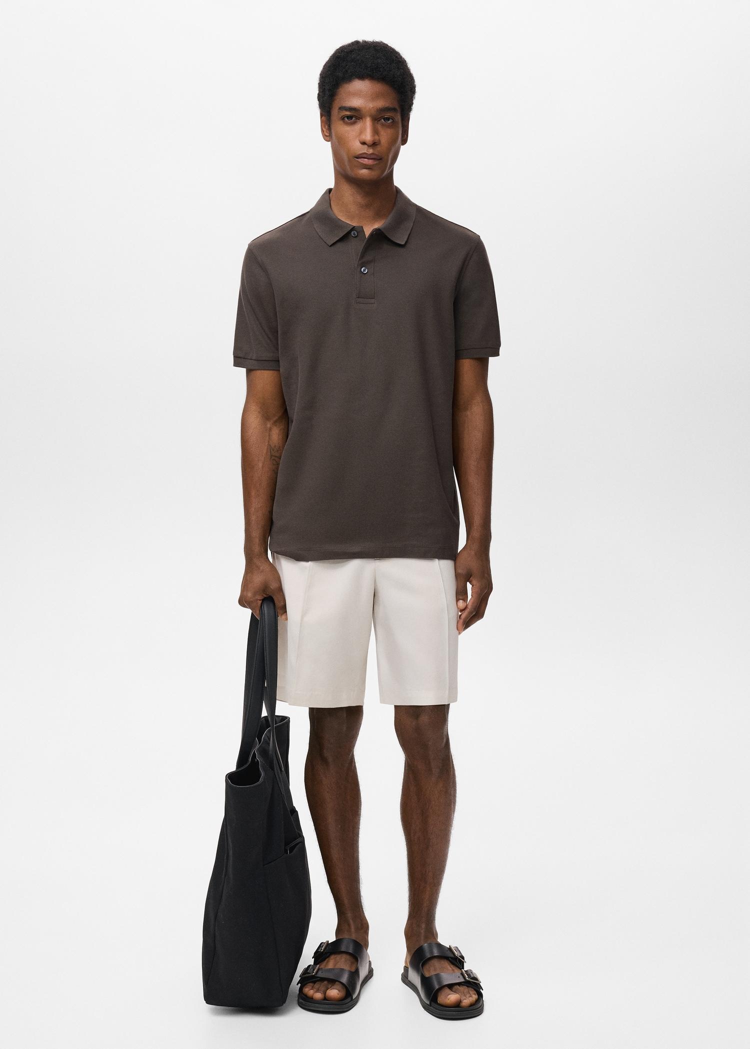 Regular-fit cotton piqué polo shirt - Men | MANGO USA Product Image