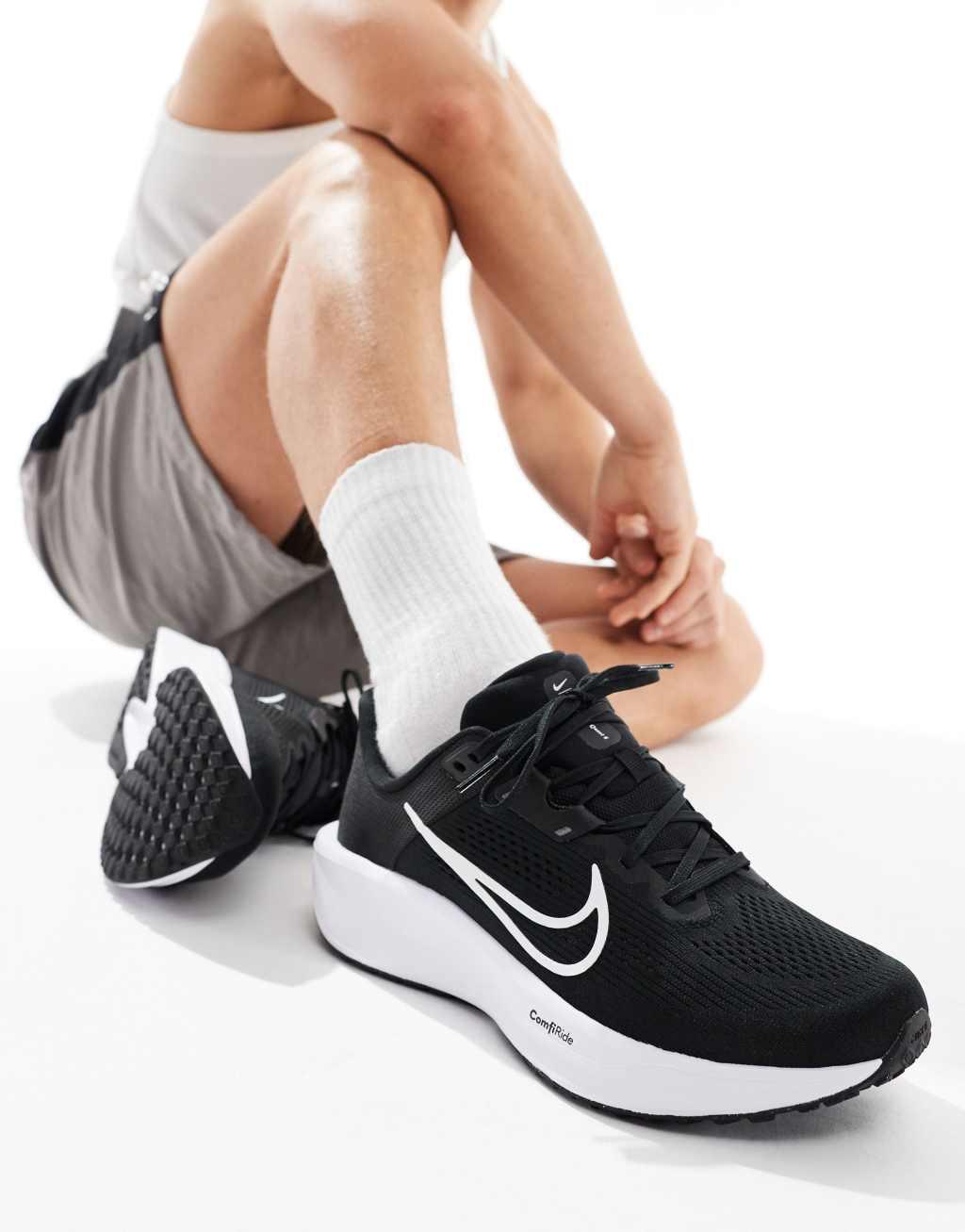 Nike Running Quest 6 sneakers in black and white Product Image