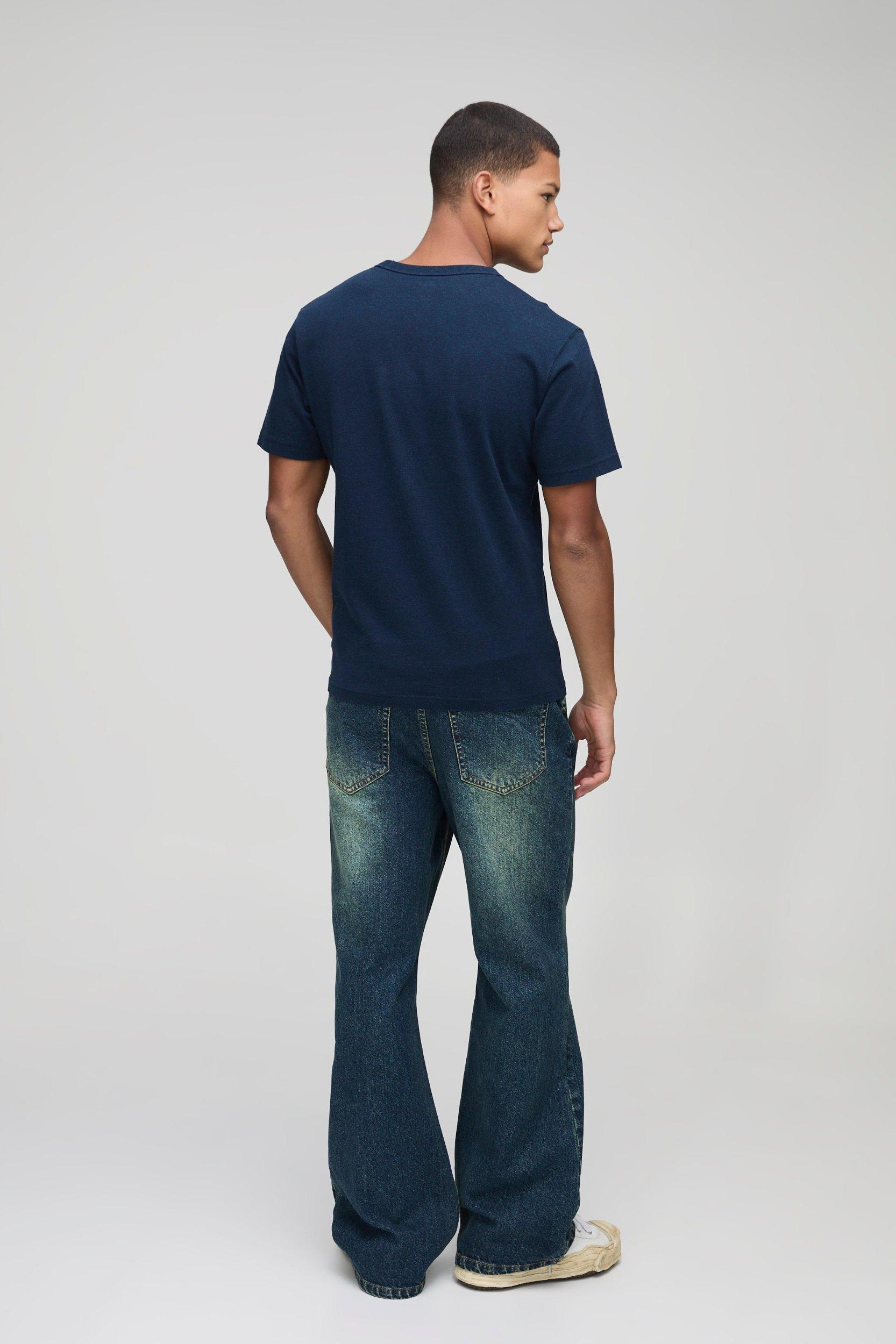 Relaxed Flare Washed Blue Jeans | boohooMAN USA Product Image