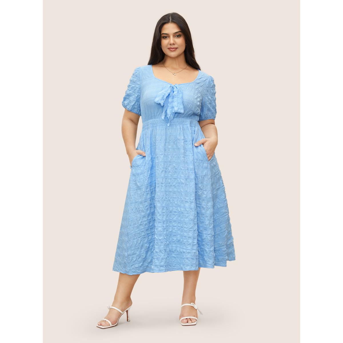 Plus Size Citrus Plain Texture Shirred Tie Knot Lantern Sleeve Dress LightBlue Women Elegant Tie knot Heart neckline Short sleeve Curvy Midi Dress BloomChic 14-16/1X Product Image