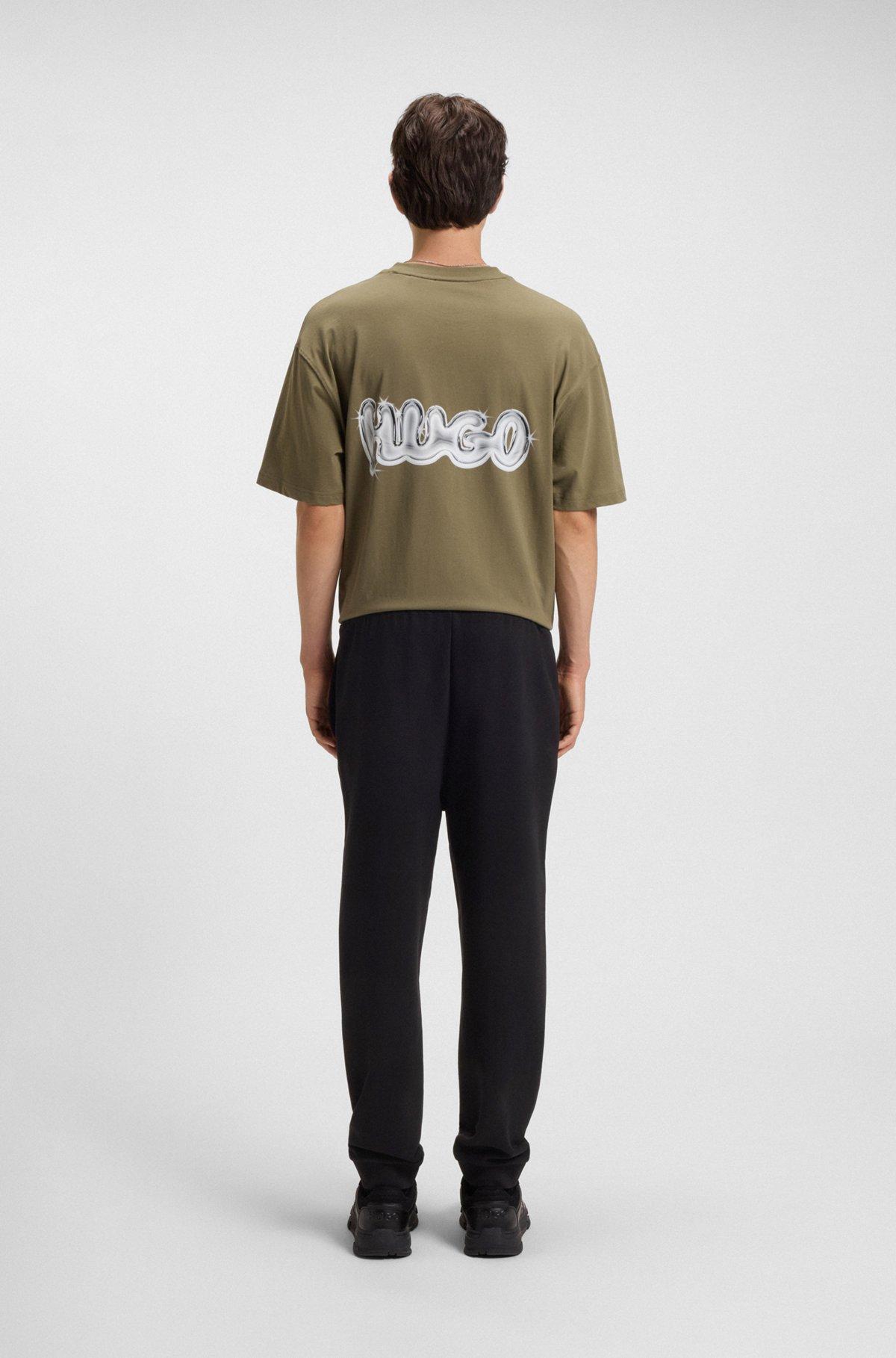 Cotton-terry tracksuit bottoms with Happy HUGO Product Image