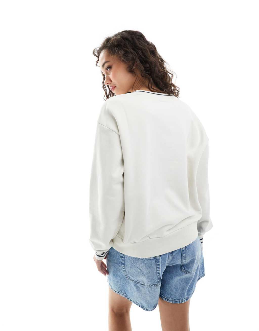 Levi's heritage logo tipped sweatshirt in cream Product Image