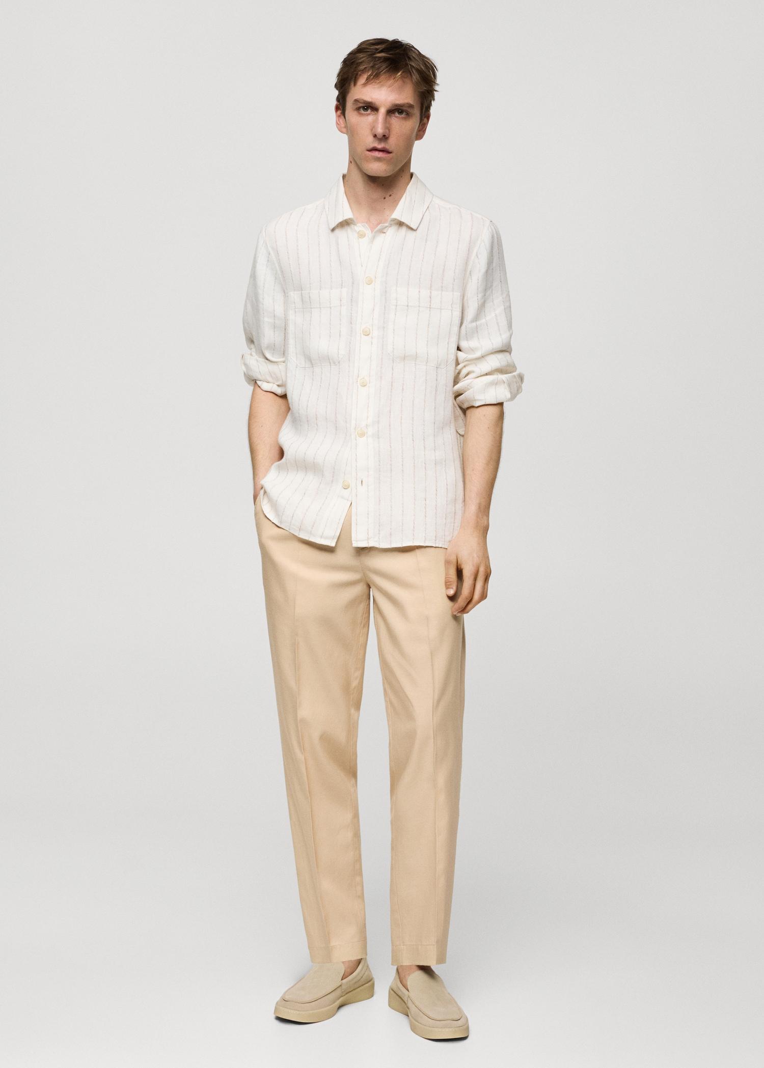 Cotton lyocell pleated pants - Men | MANGO USA Product Image