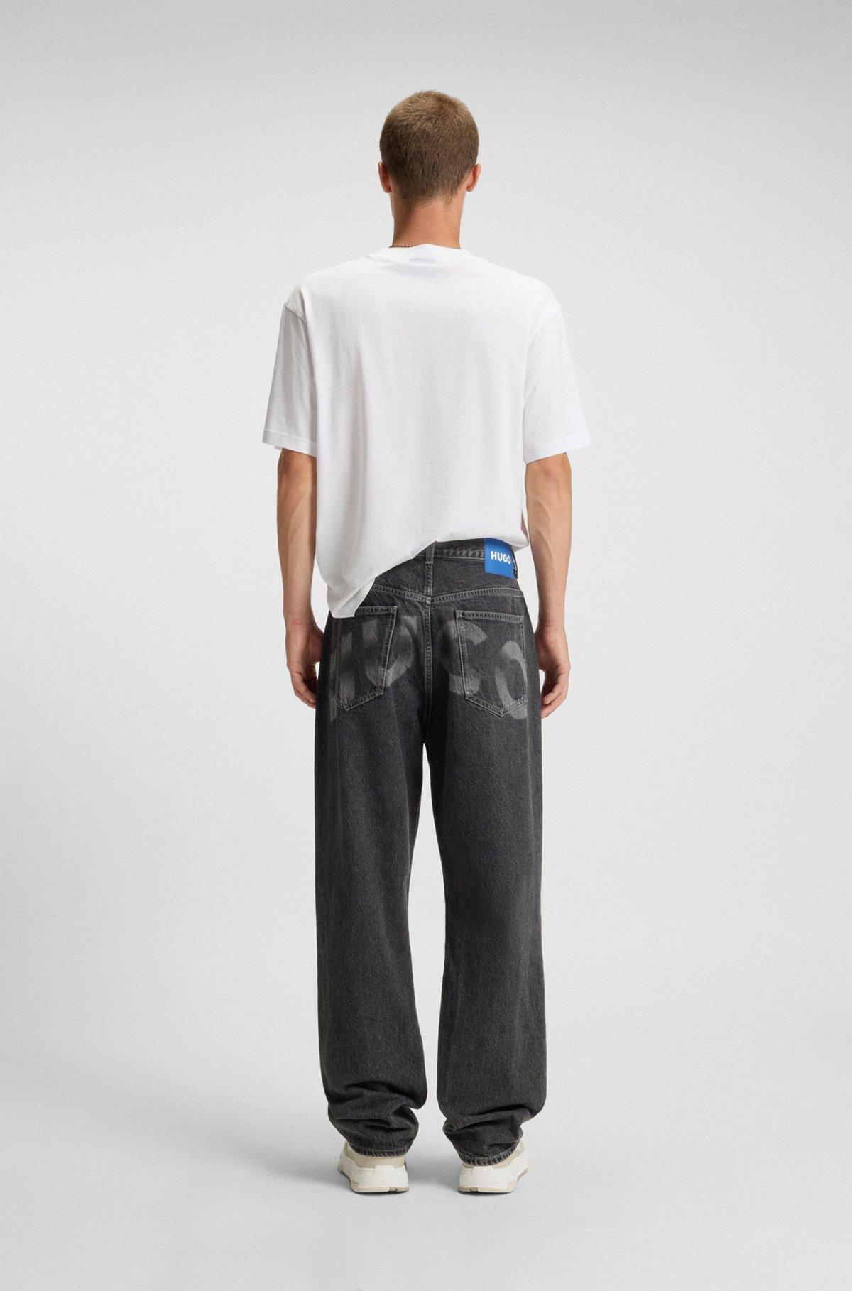 Baggy-fit jeans in black denim with faded logo Product Image