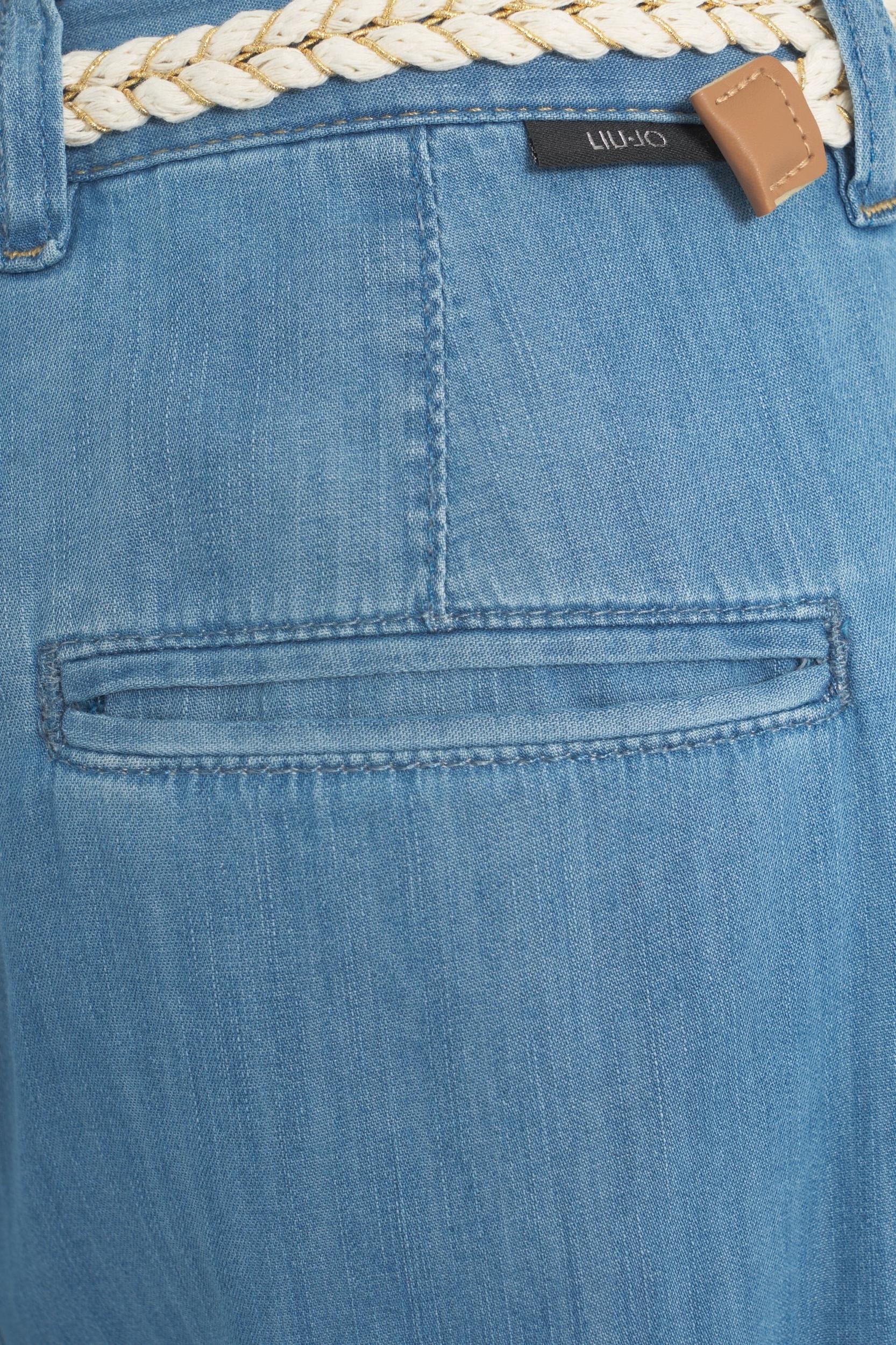 Flared pants with belt Product Image