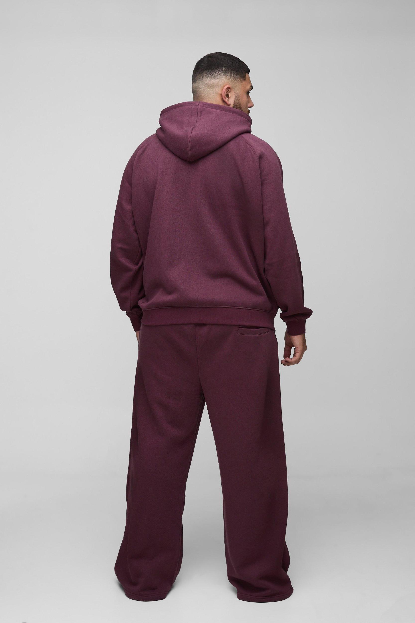 Plus Oversized Raglan Zip Thru Embroidered Spray Wash Hooded Tracksuit | boohooMAN USA Product Image