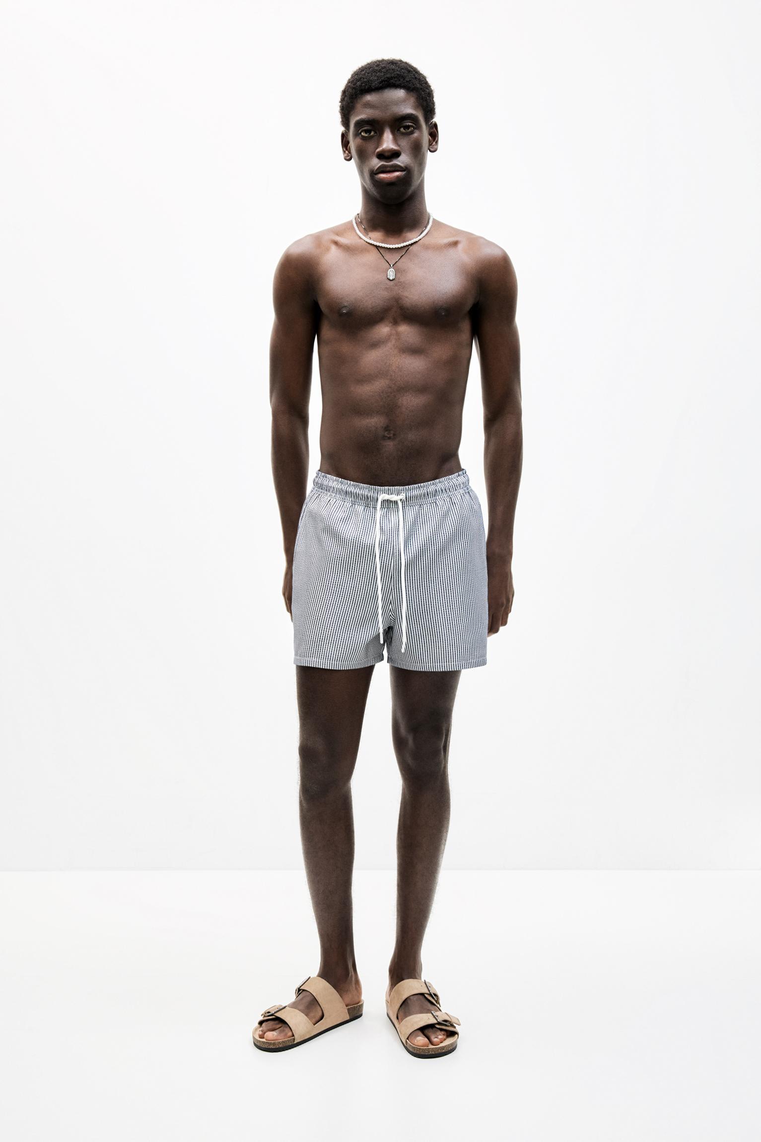 Striped seersucker swimming trunks Product Image