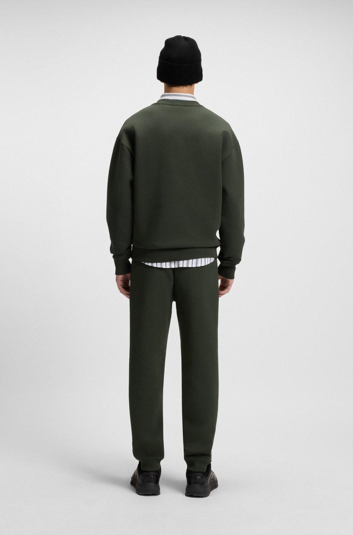 HUGO - Cotton tracksuit bottoms with stacked logo - Dark Green Product Image