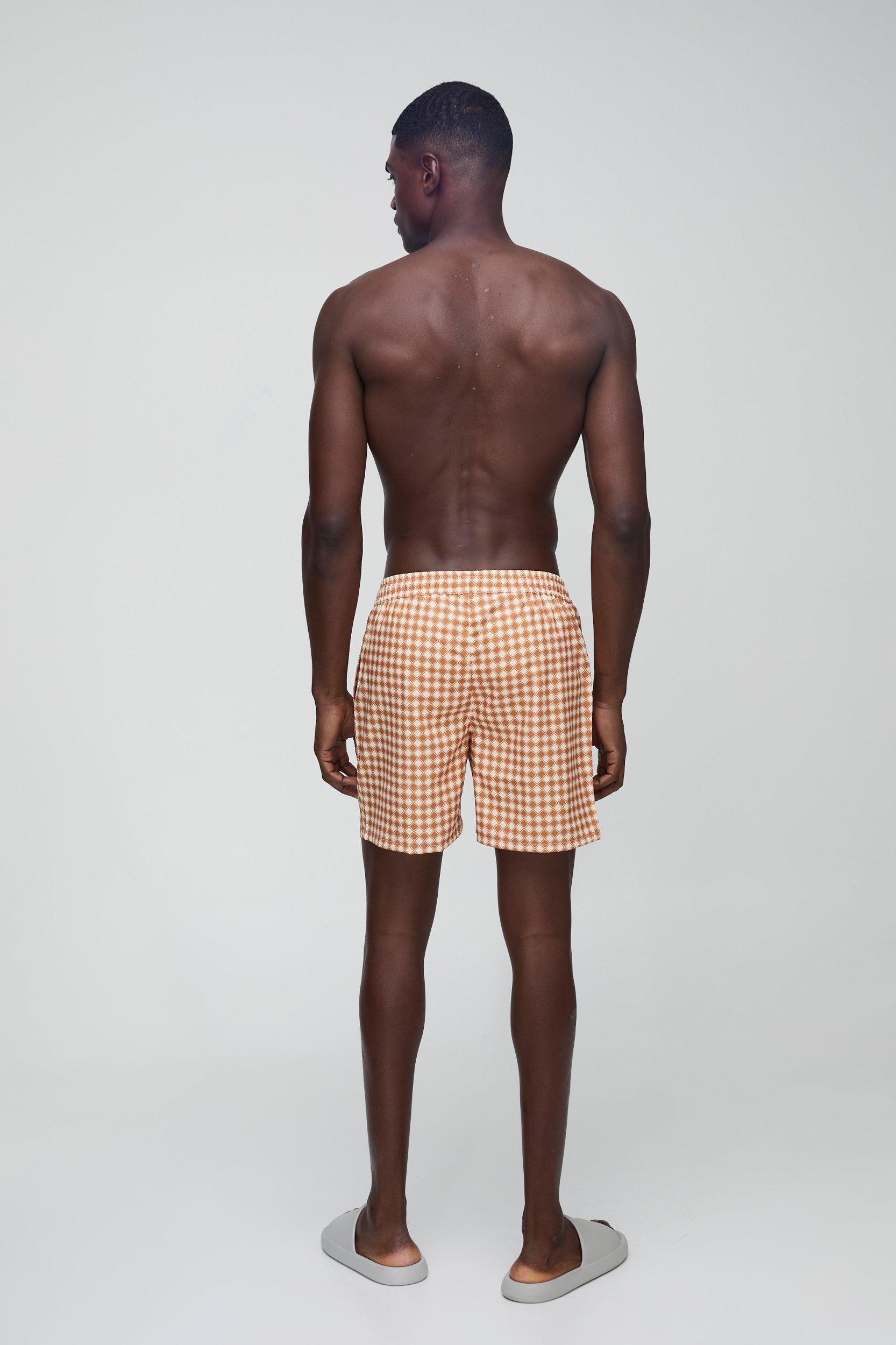 Mid Length Geo Print Swim Trunks | boohooMAN USA Product Image