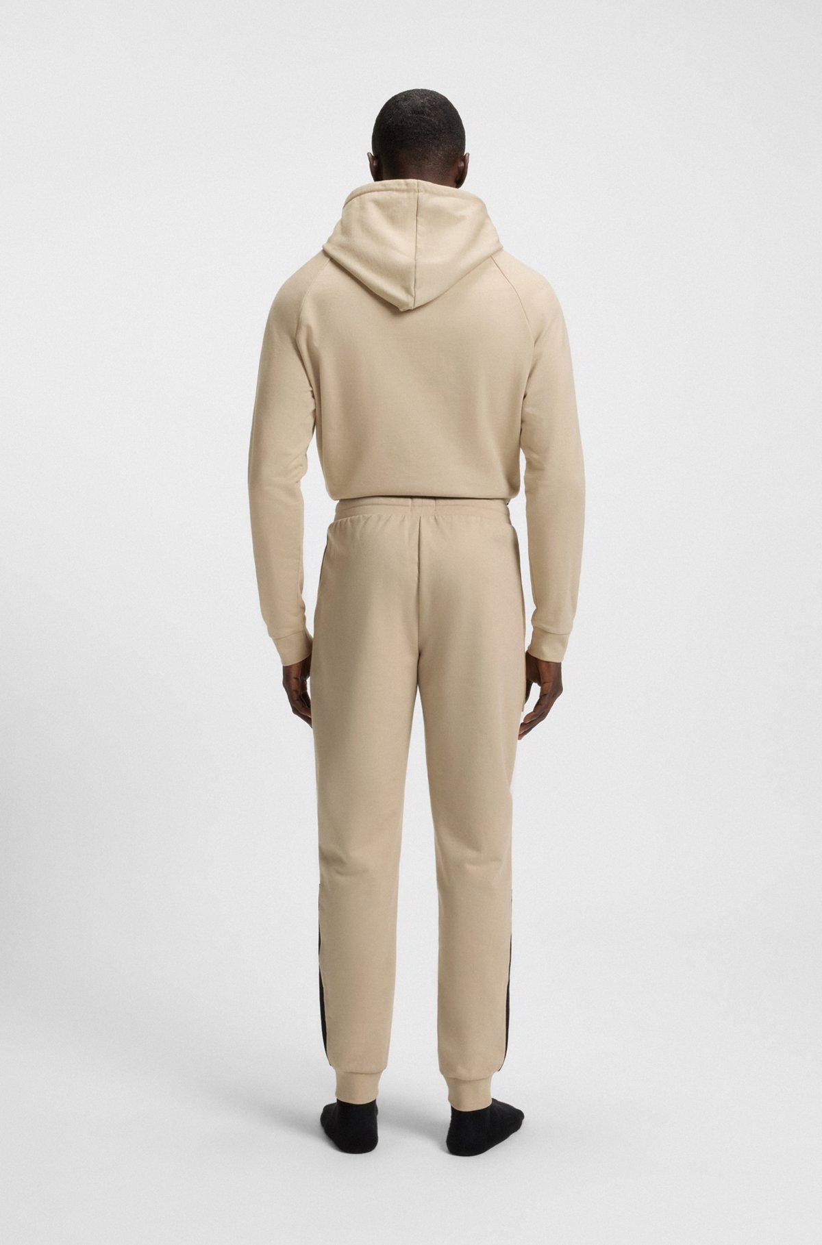Cotton-terry tracksuit bottoms with contrast side panels Product Image