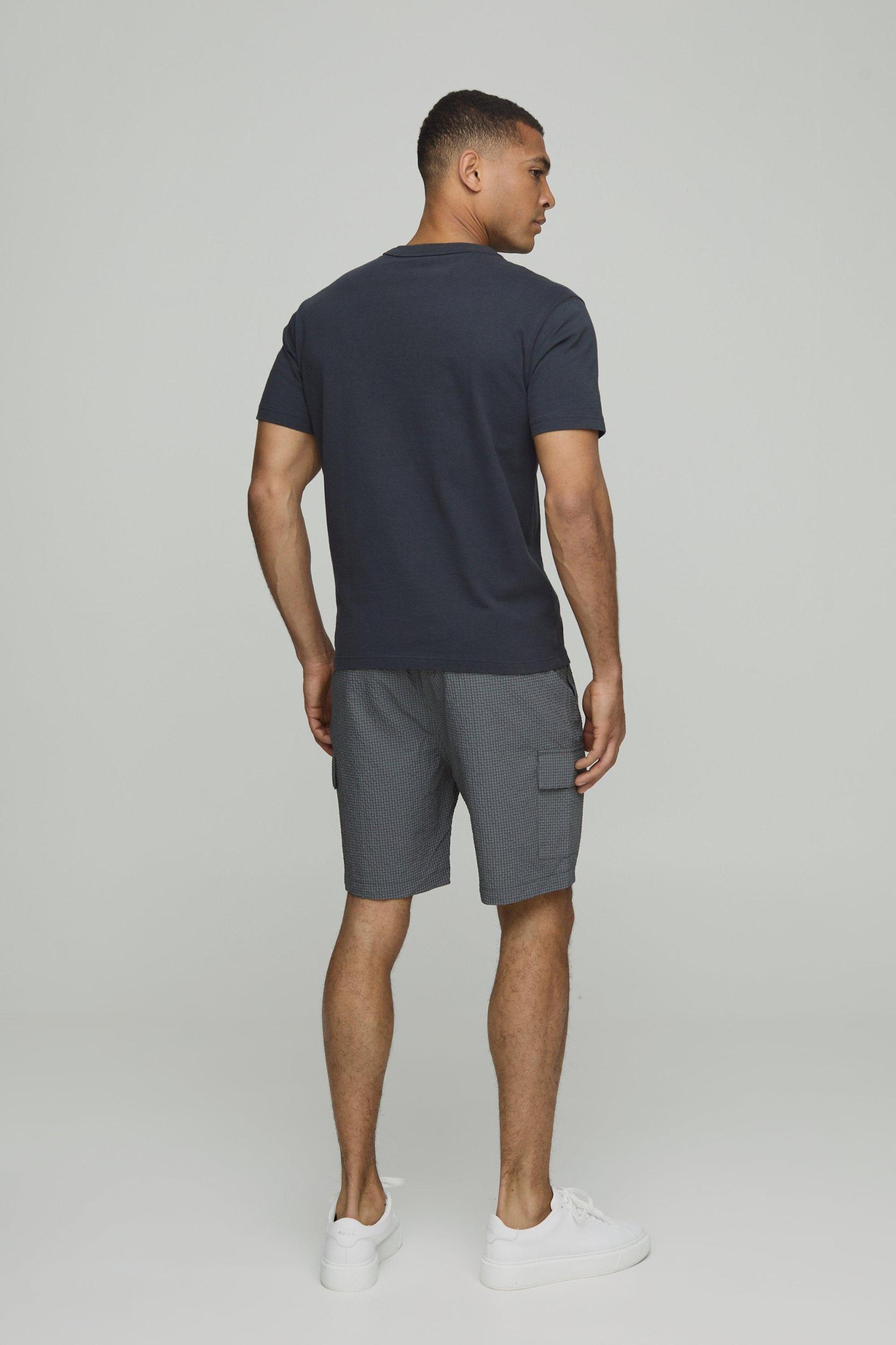 Elasticated Waist Relaxed Mid Length Seersucker Cargo Shorts | boohooMAN USA Product Image