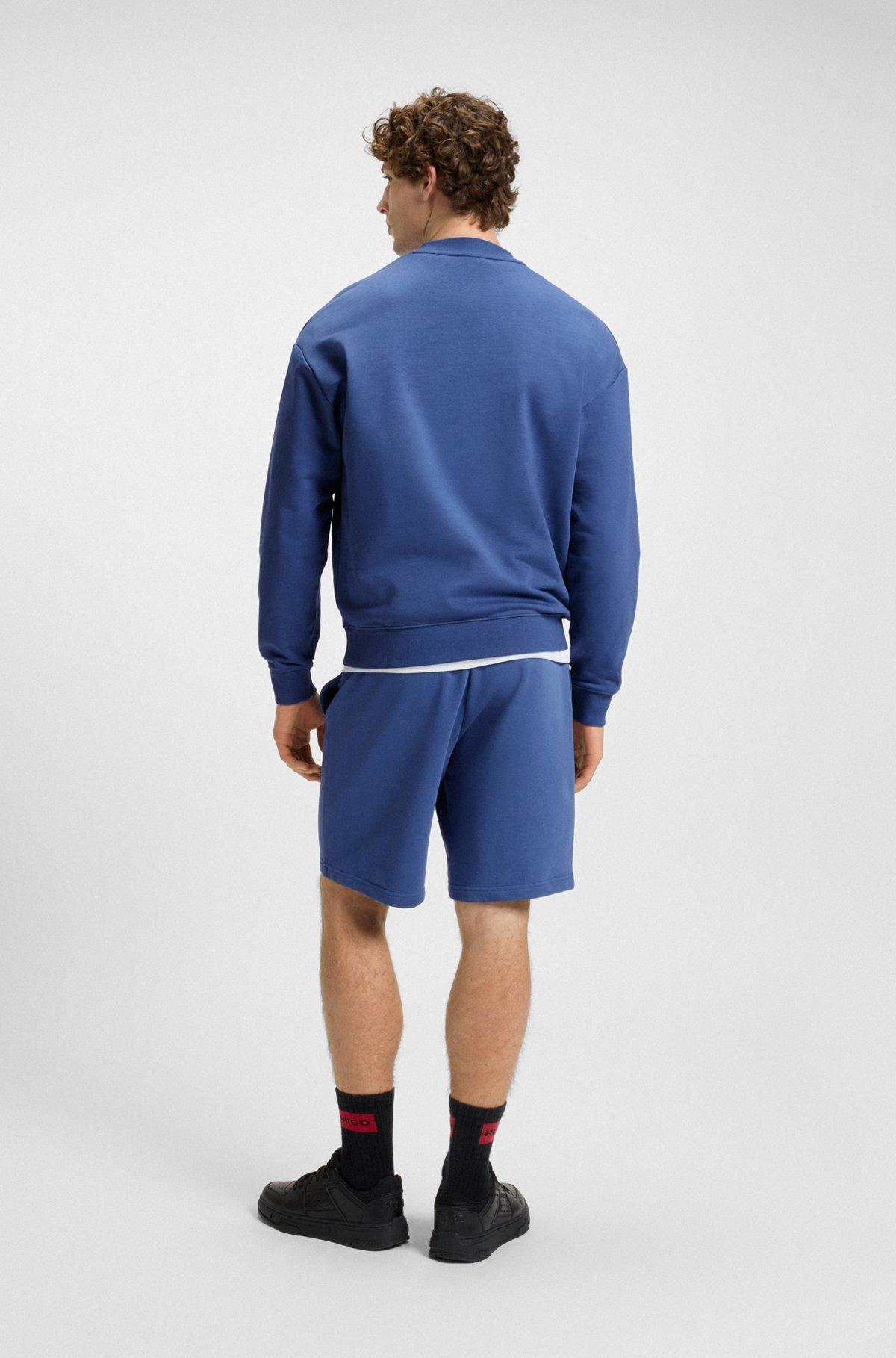 HUGO - Relaxed-fit shorts in cotton terry with logo print - Blue Product Image