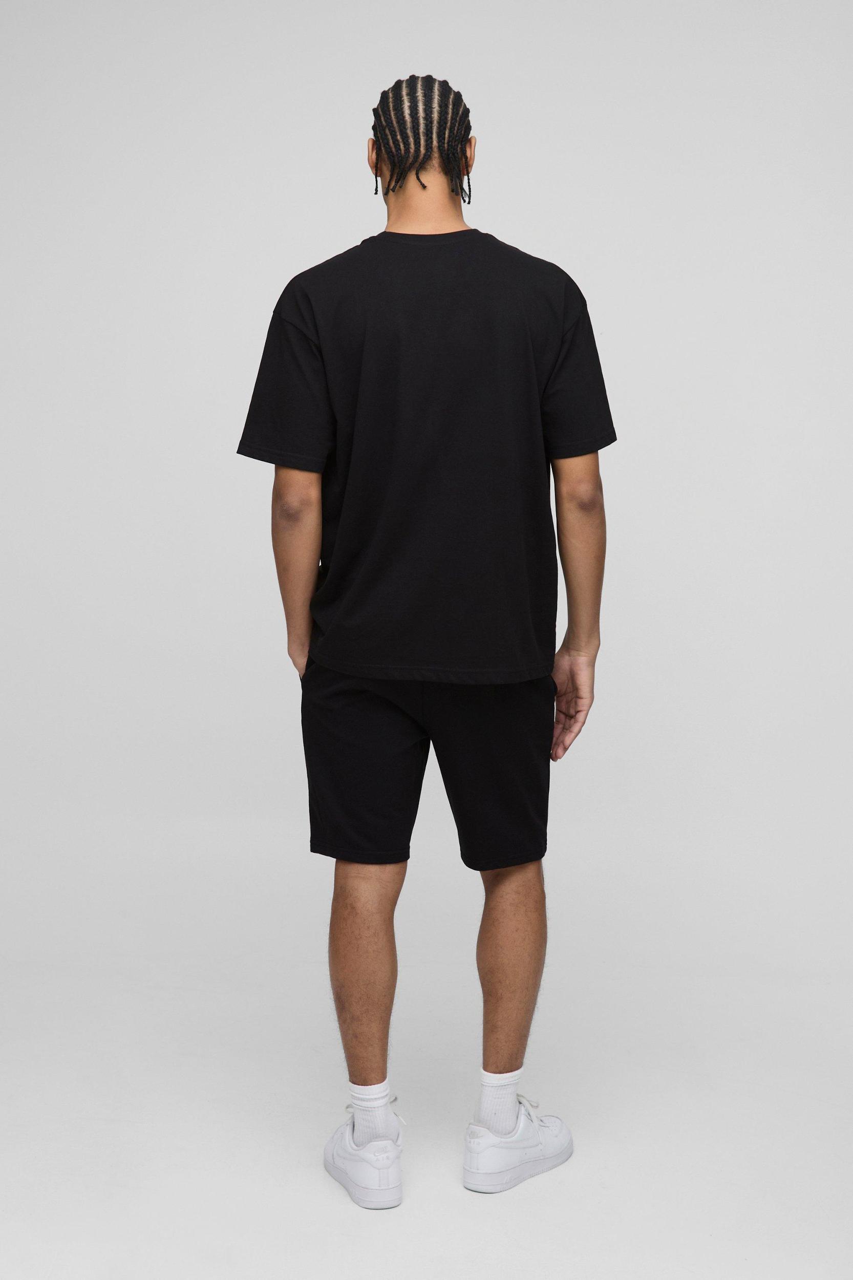 260GSM Loopback Basic MAN. Slim Fit Mid Length Shorts | boohooMAN USA Product Image