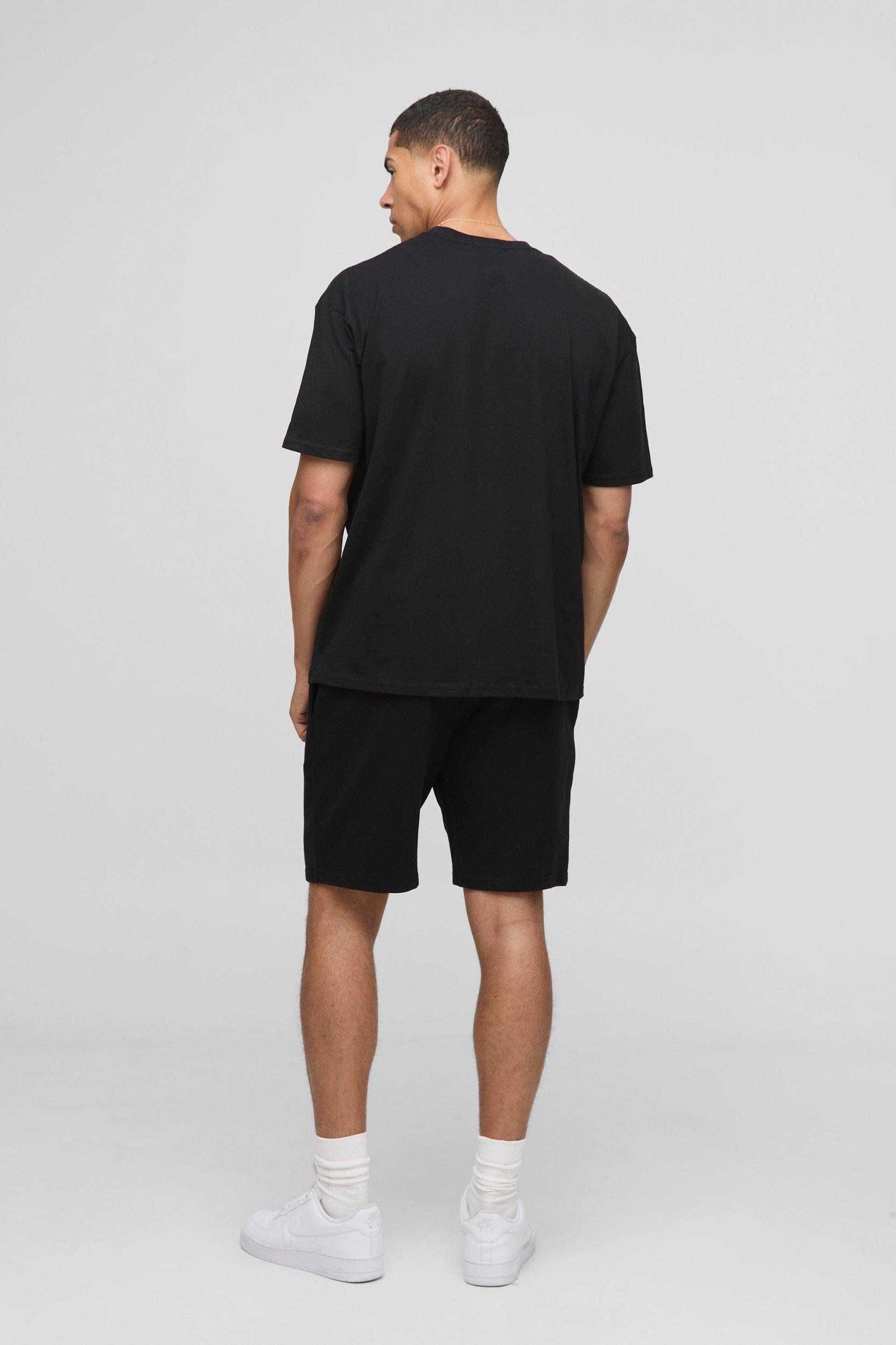 Black Oversized MAN Sunset Printed T-Shirt | boohooMAN USA Product Image