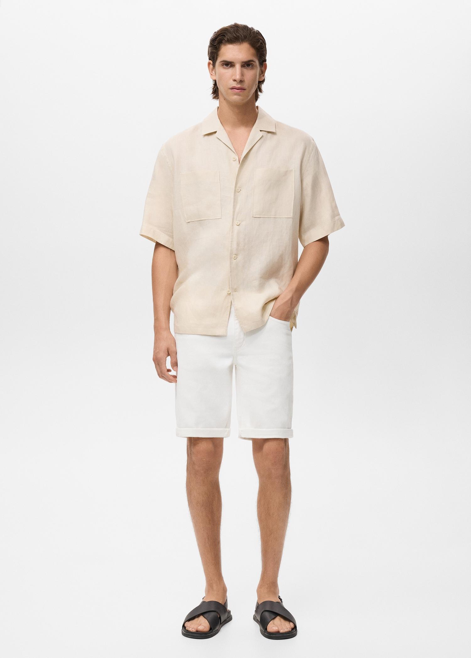 Slim-fit denim bermuda shorts - Men | MANGO USA Product Image
