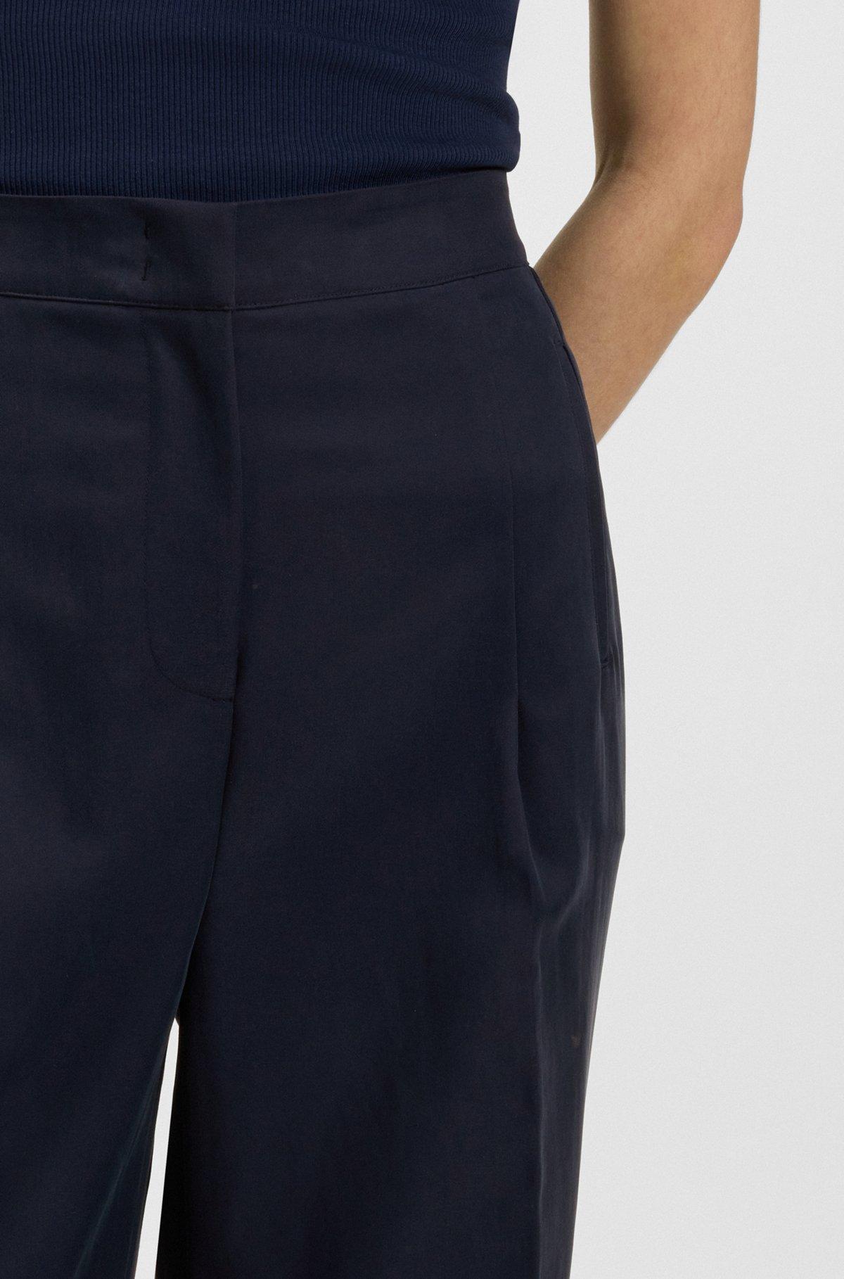 Formal trousers with pleat details Product Image
