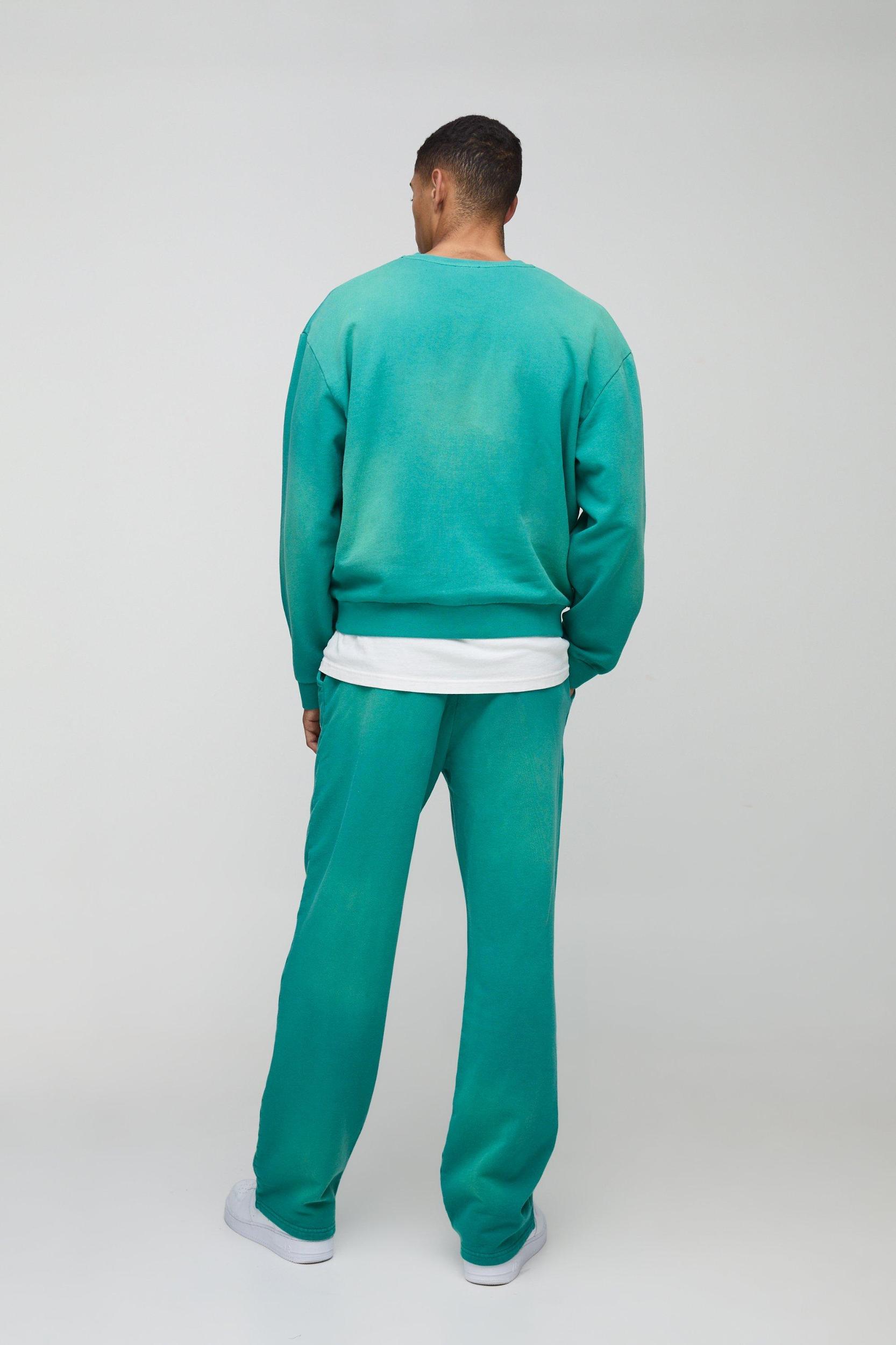 Relaxed Fit Spray Wash Ofcl Printed Sweatpants | boohooMAN USA Product Image