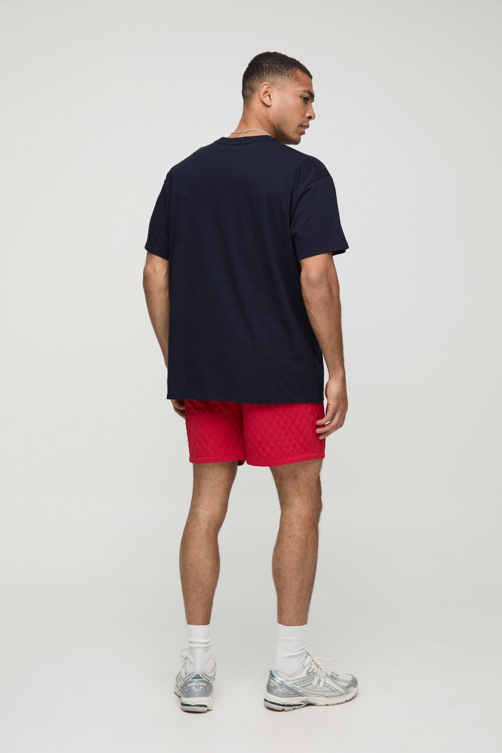Navy Oversized Embroidered MAN T-Shirt | boohooMAN USA Product Image