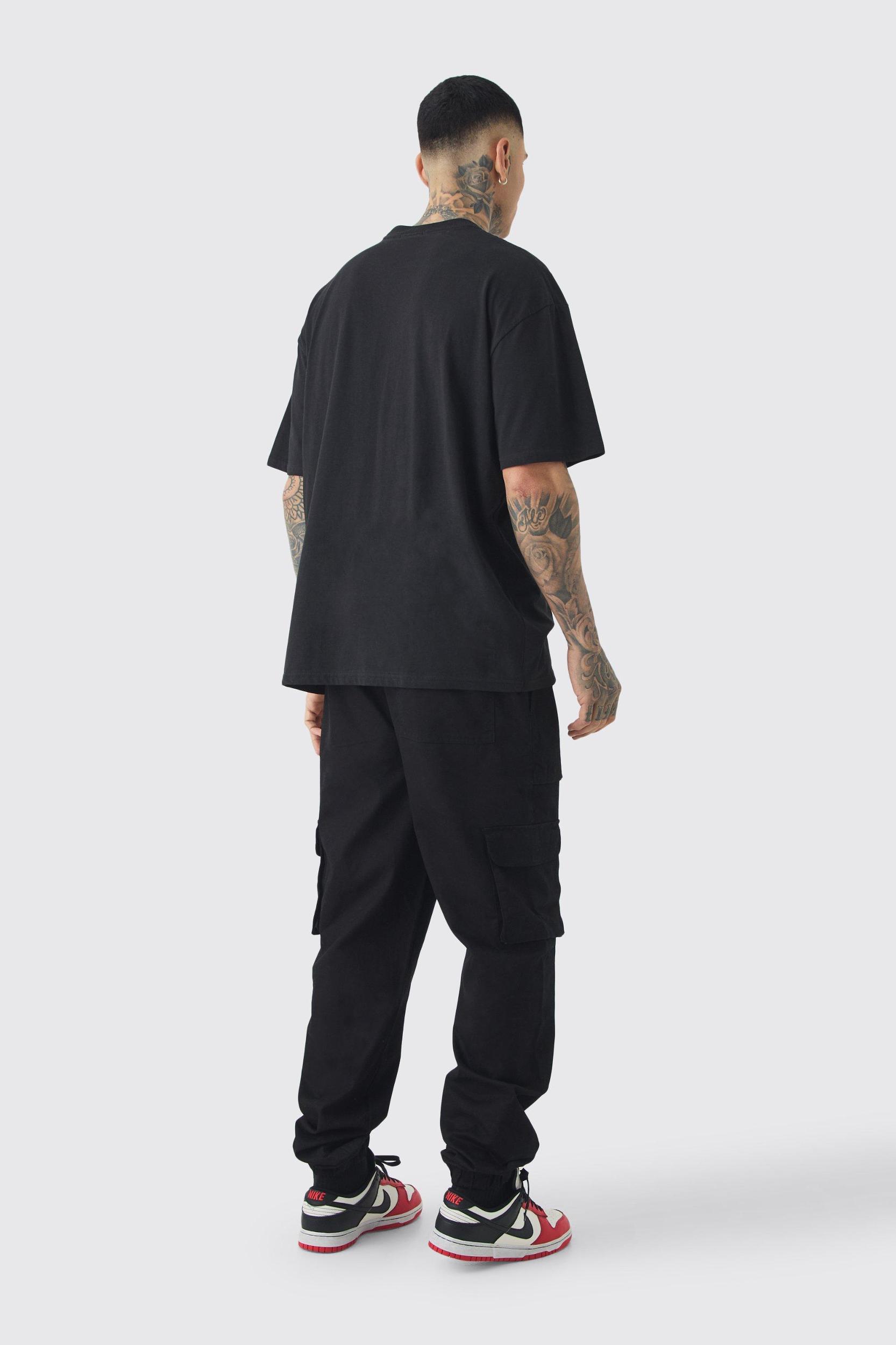 Tall Cuffed Hem Woven Tab Cargo Pants In Black | boohooMAN USA Product Image