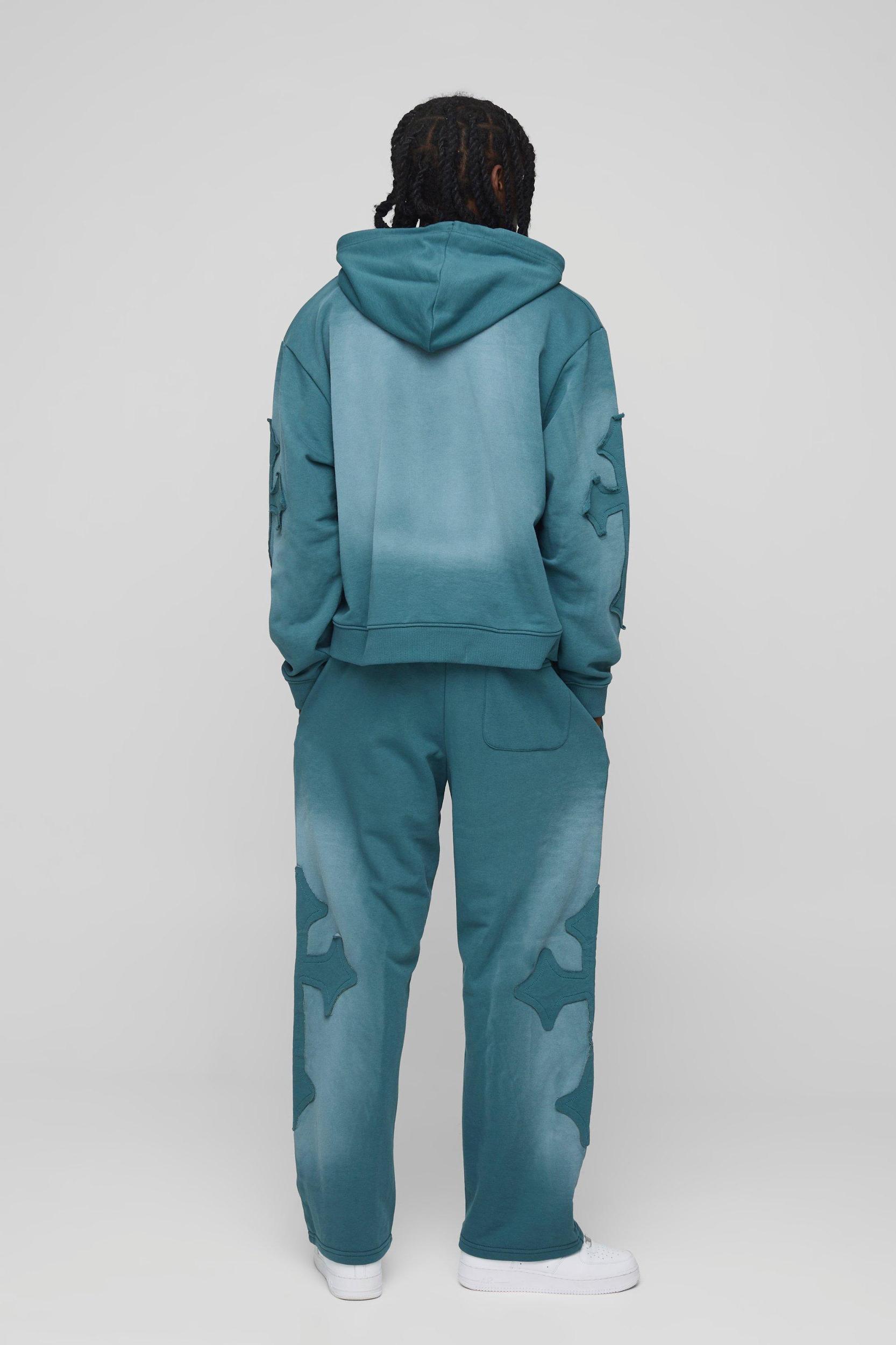 Oversized Boxy Cross Applique Wash Hooded Tracksuit | boohooMAN USA Product Image