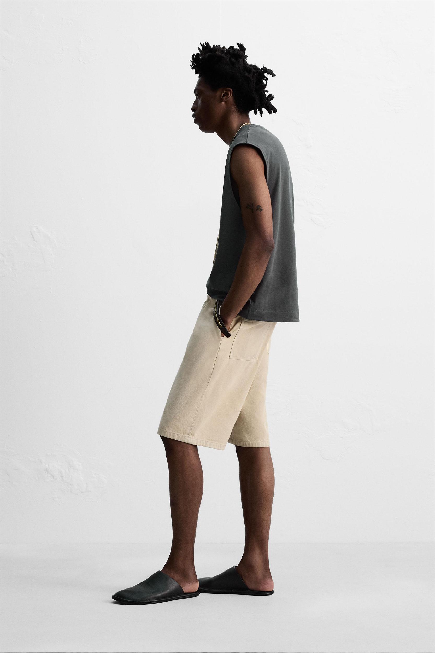 BAGGY FIT BERMUDA SHORTS © OTIS KWAME KYE QUAICOE Product Image