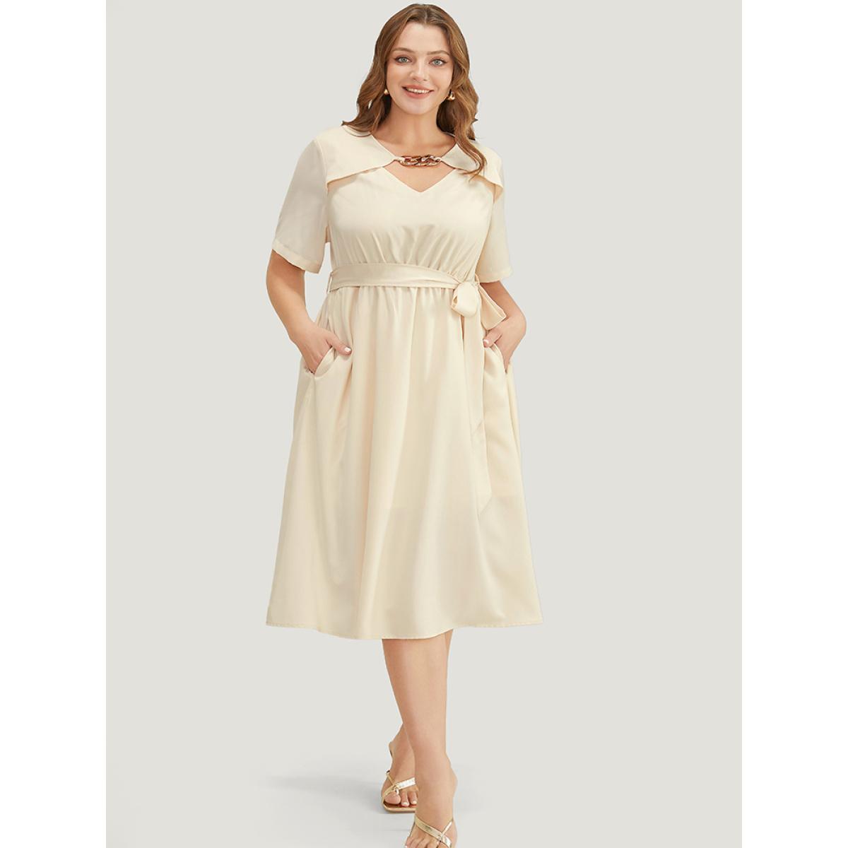 Plus Size Solid Chain Detail Cut Out Pocket Belted Flutter Dress Beige Women Office Cross straps V-neck Short sleeve Curvy Midi Dress BloomChic 30/6X Product Image