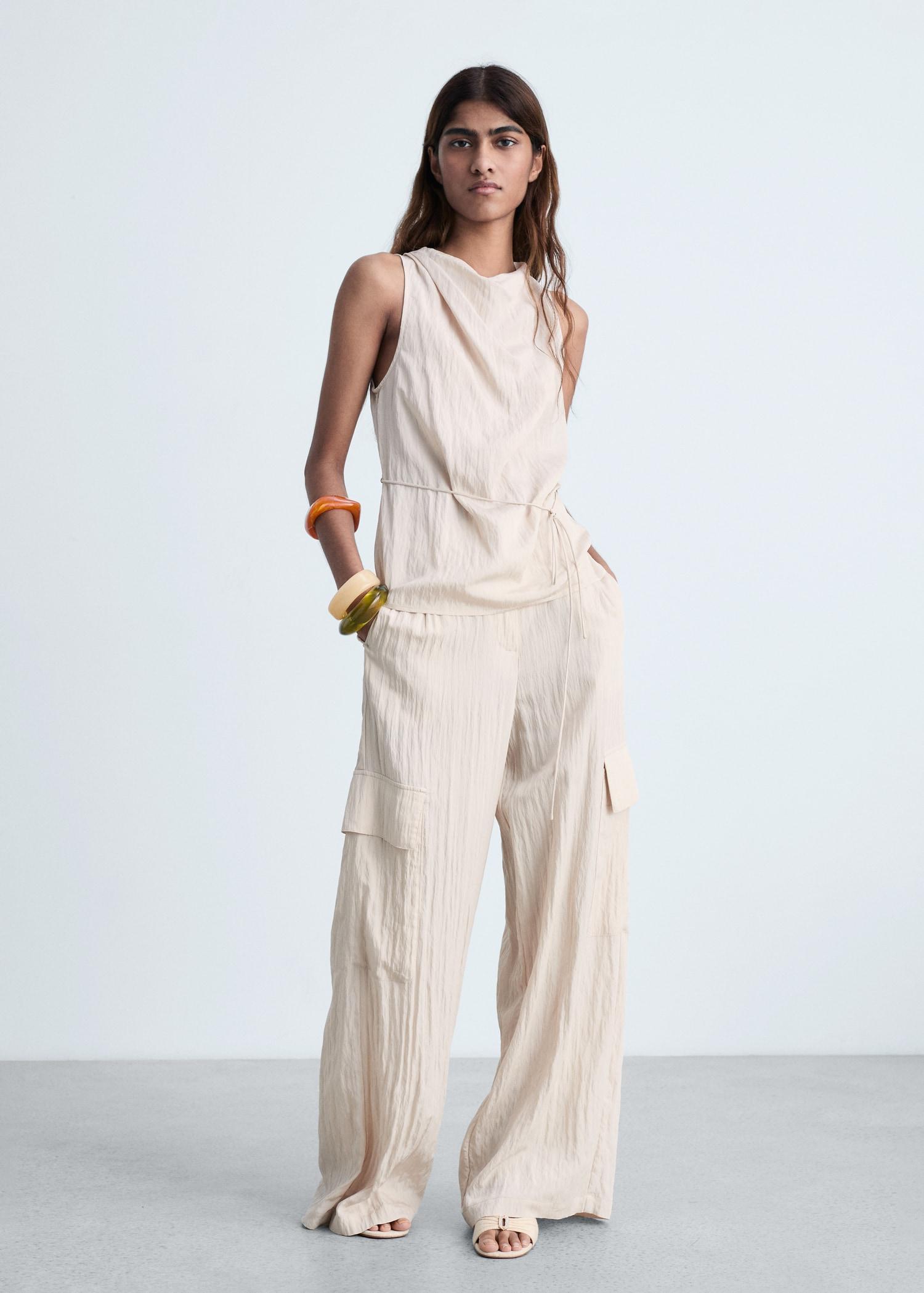 Textured bow top - Women | MANGO USA Product Image