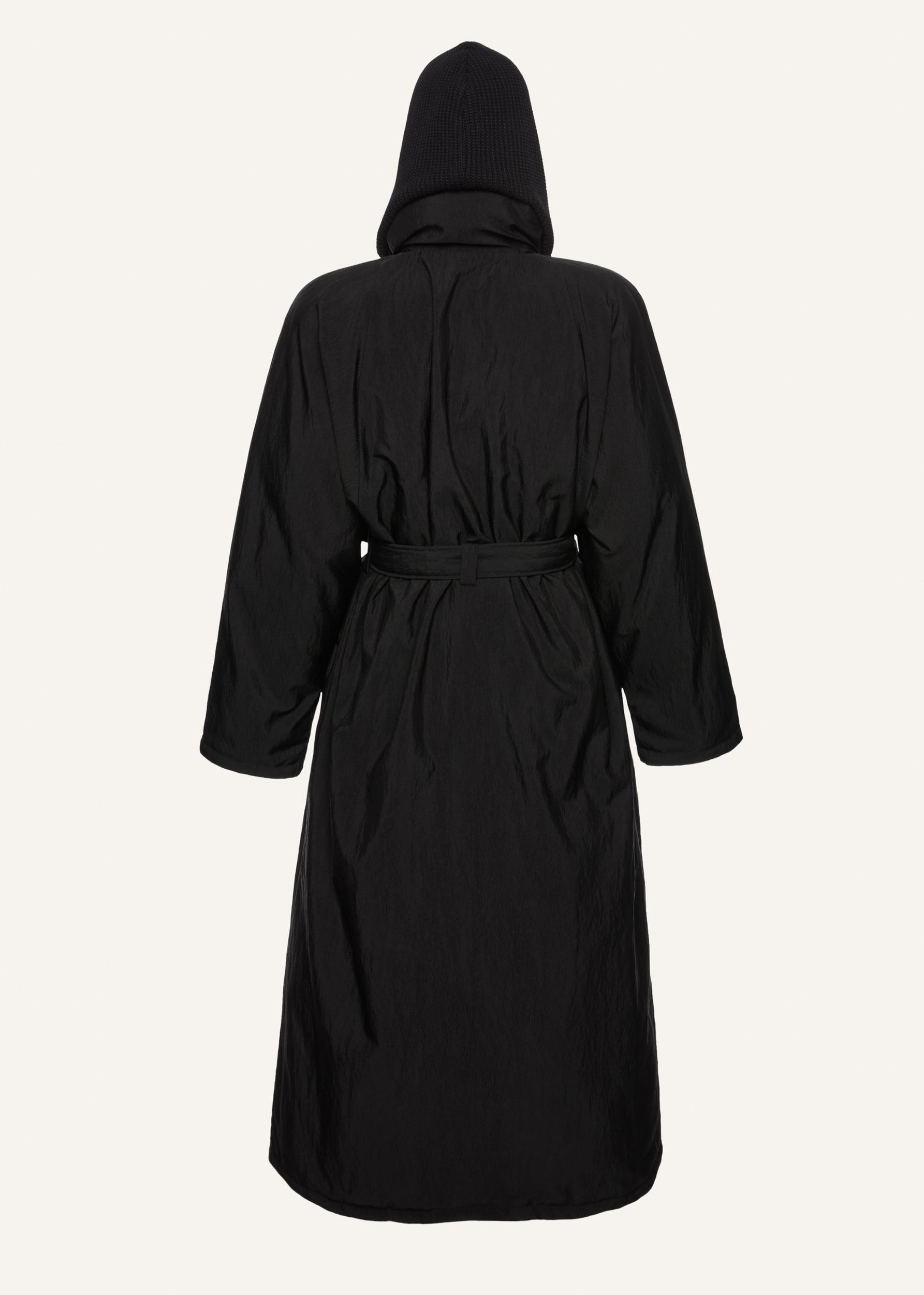 Knit hood long puffer coat in black Product Image