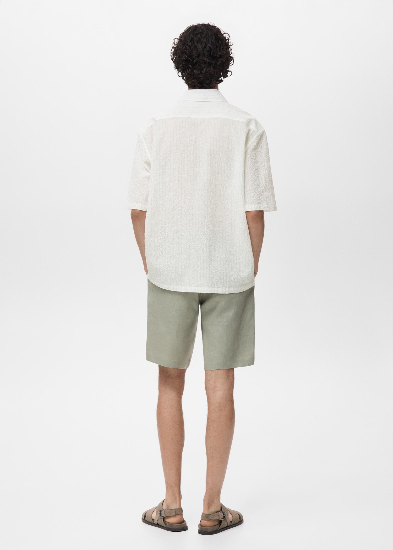 Wrinkled-effect pinstripe shirt - Men | MANGO USA Product Image