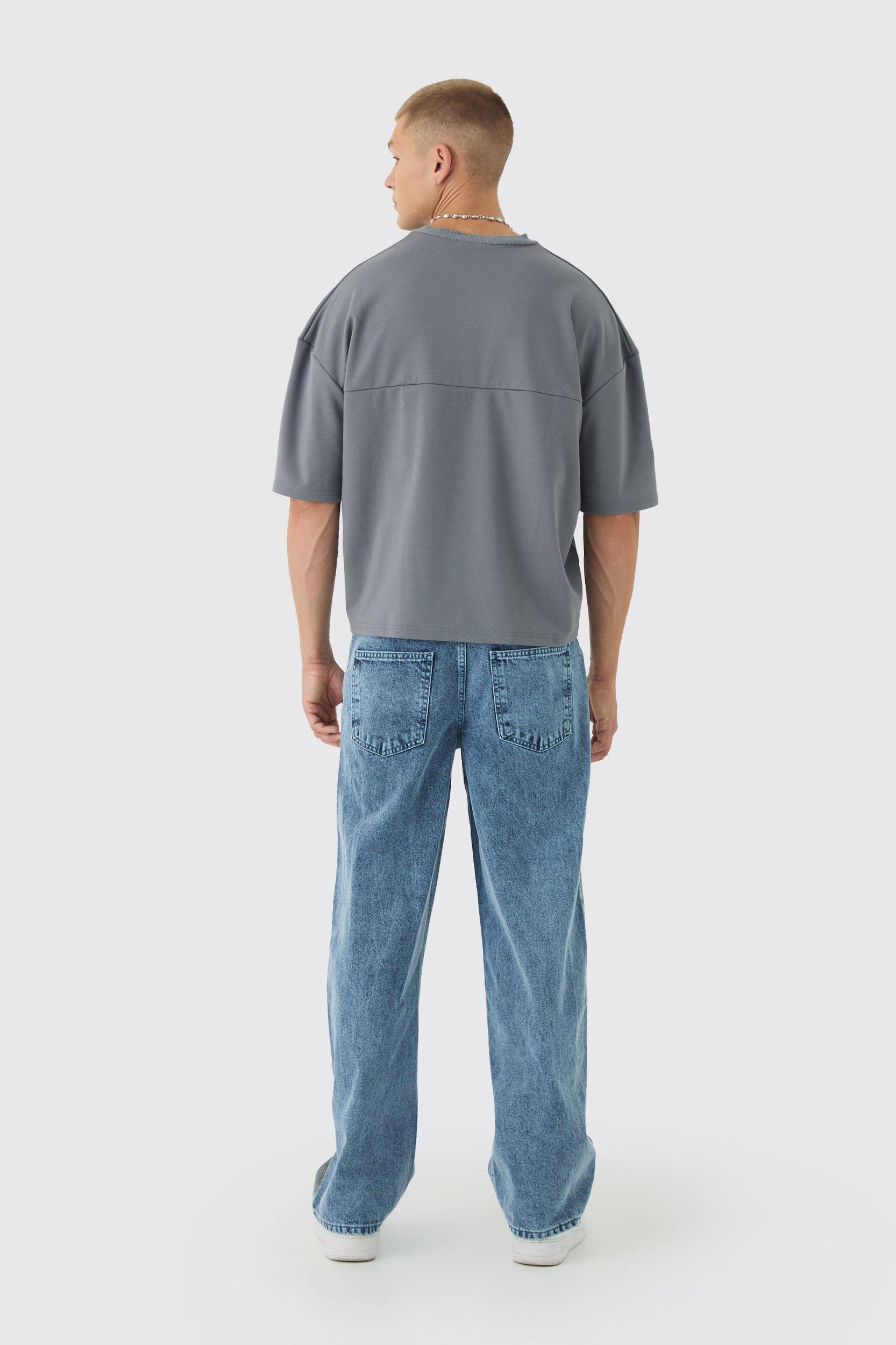 Baggy Rigid Elasticated Waist Moto Jeans | boohooMAN USA Product Image