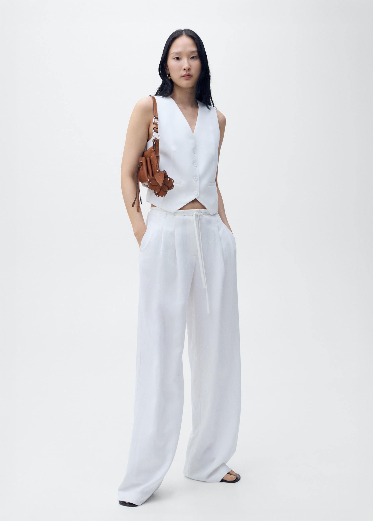 Lyocell suit pants with bow belt - Women | MANGO USA Product Image