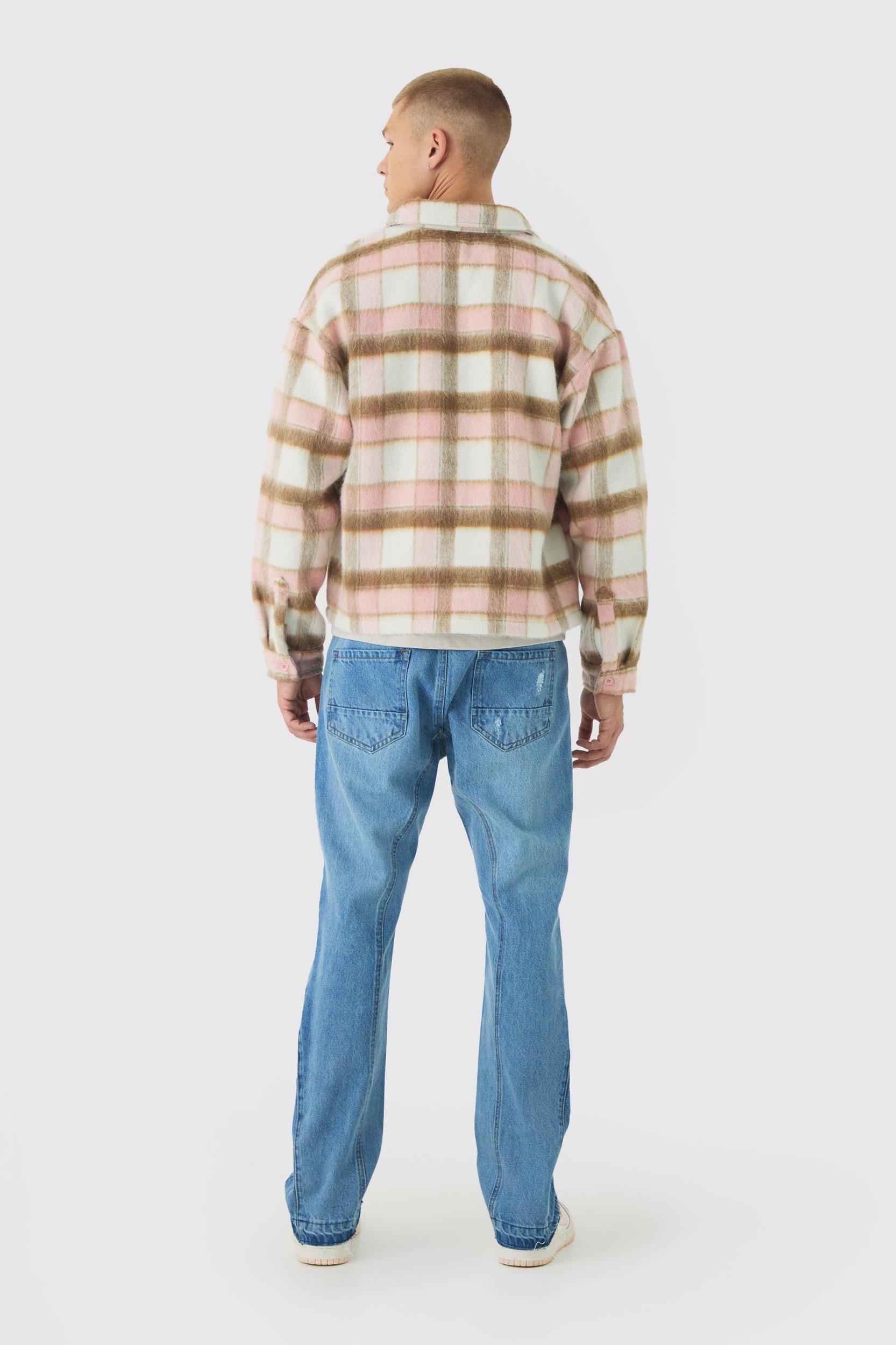 Slim Fit Flared Ripped Knee Jeans With Let Down Hem | boohooMAN USA Product Image