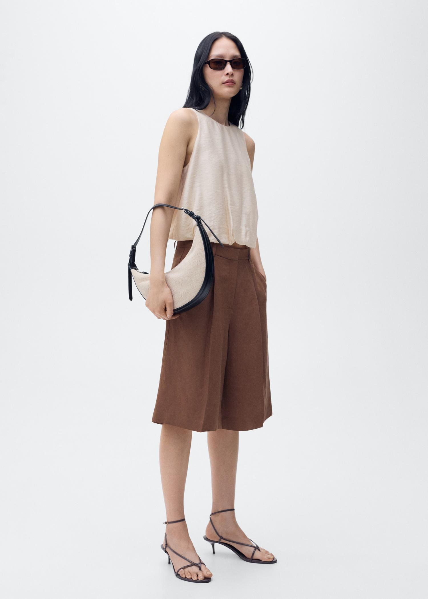 Lyocell-blend top with puffed hem - Women | MANGO USA Product Image