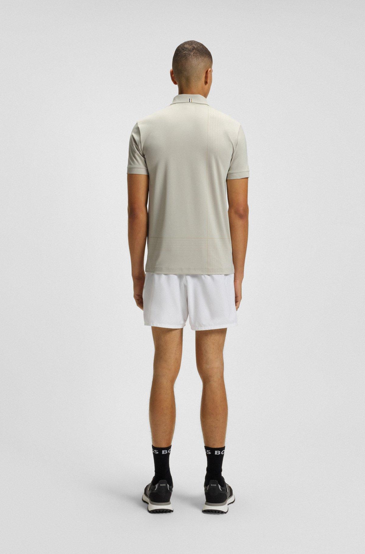 Active quick-dry polo shirt with check artwork Product Image