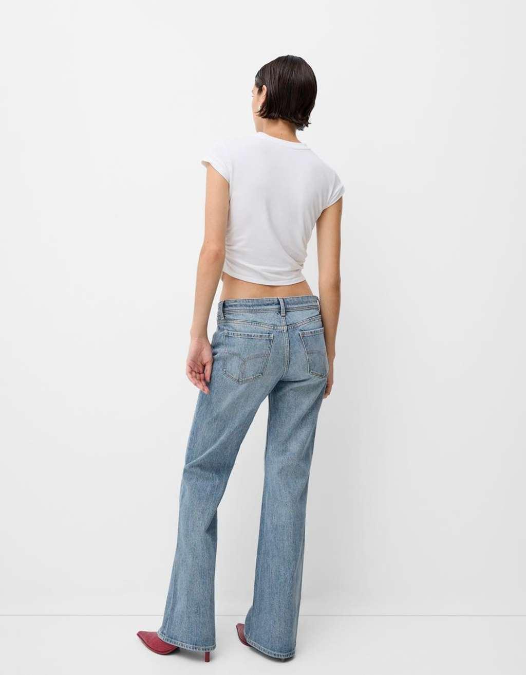 Bershka low rise flared jeans in light blue wash | ASOS Product Image
