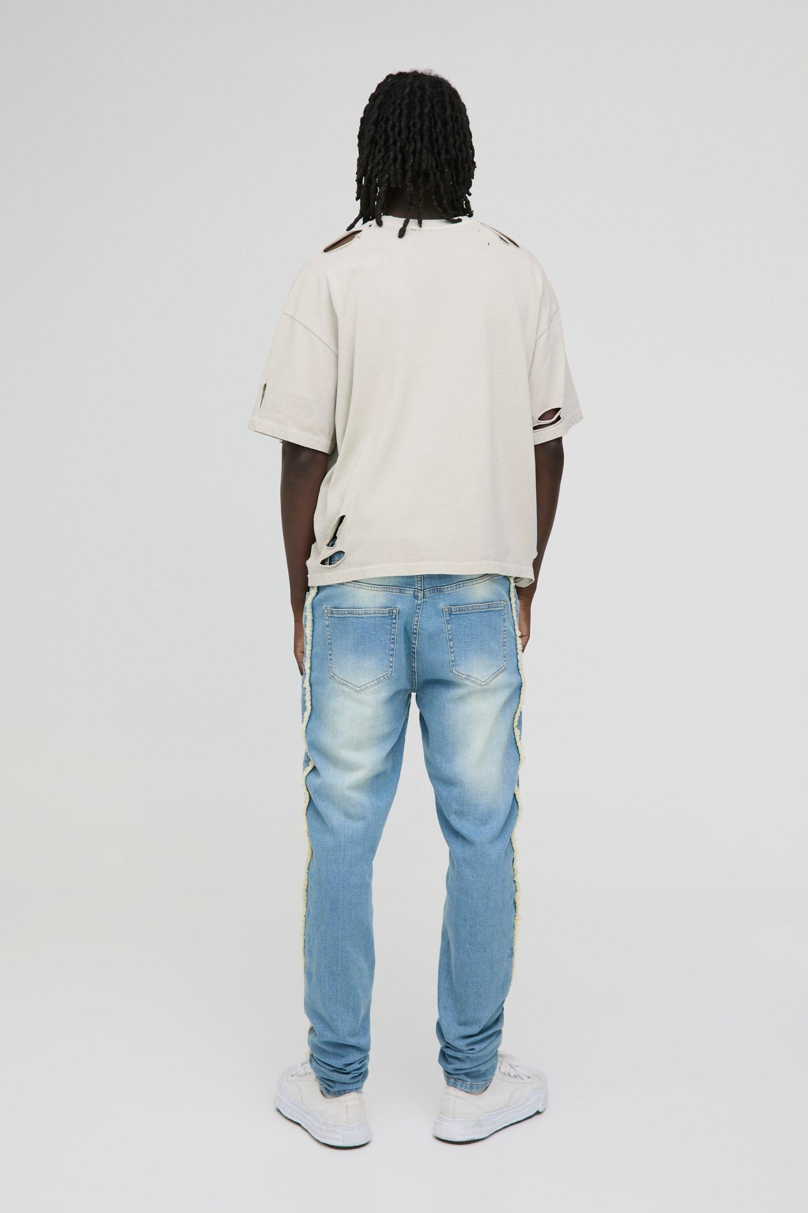 Skinny Stacked Washed Distressed Jeans | boohooMAN USA Product Image