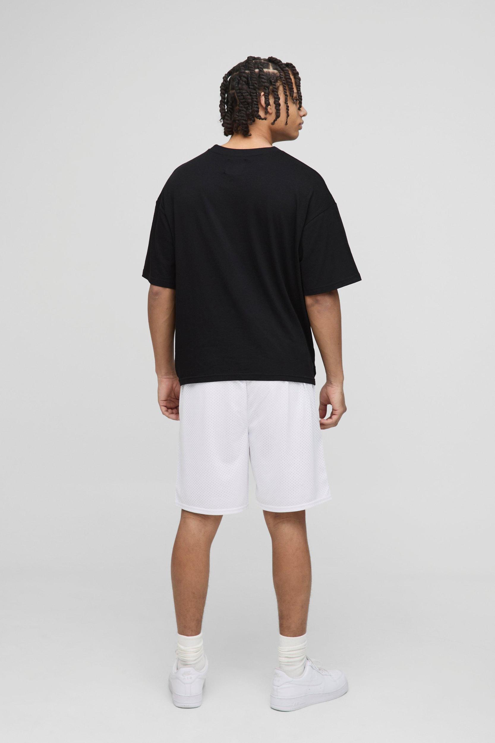 Varsity Graphic Mid Length Mesh Basketball Shorts | boohooMAN USA Product Image