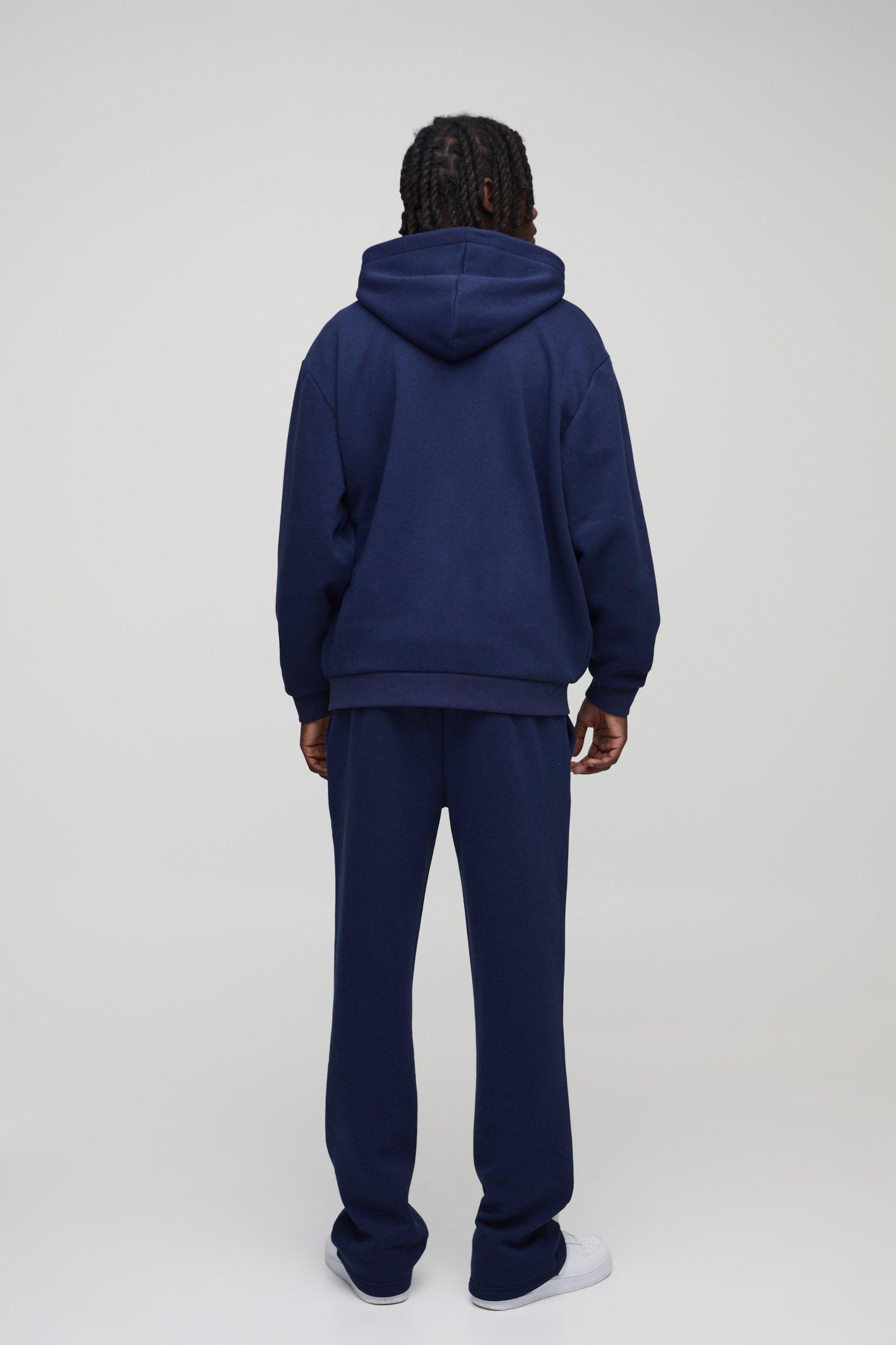 Oversized Worldwide Official Text Print Zip Through Tracksuit | boohooMAN USA Product Image