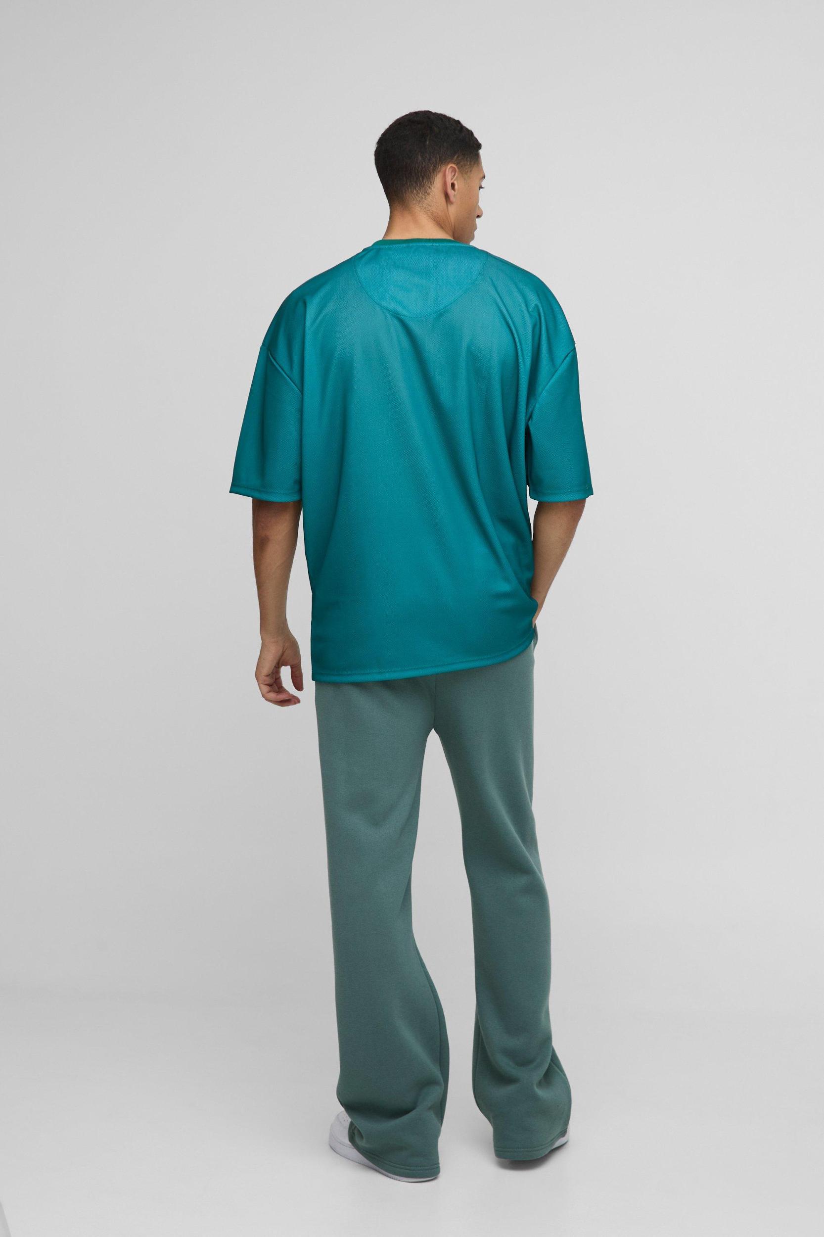 Oversized Taz Mania Varsity Mesh License Print T-Shirt | boohooMAN USA Product Image