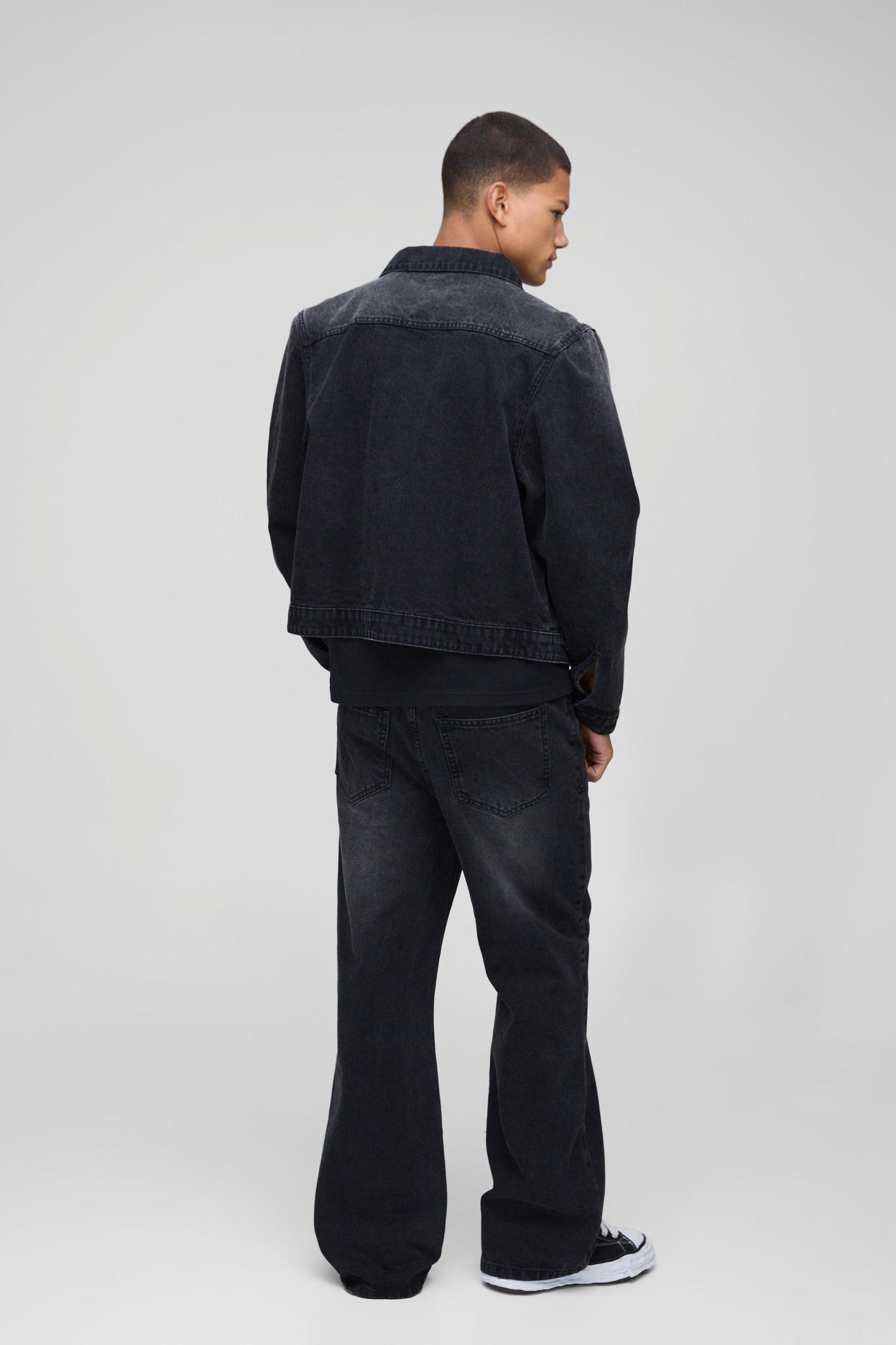 Relaxed Flare Washed Black Ripped Knee Jeans | boohooMAN USA Product Image