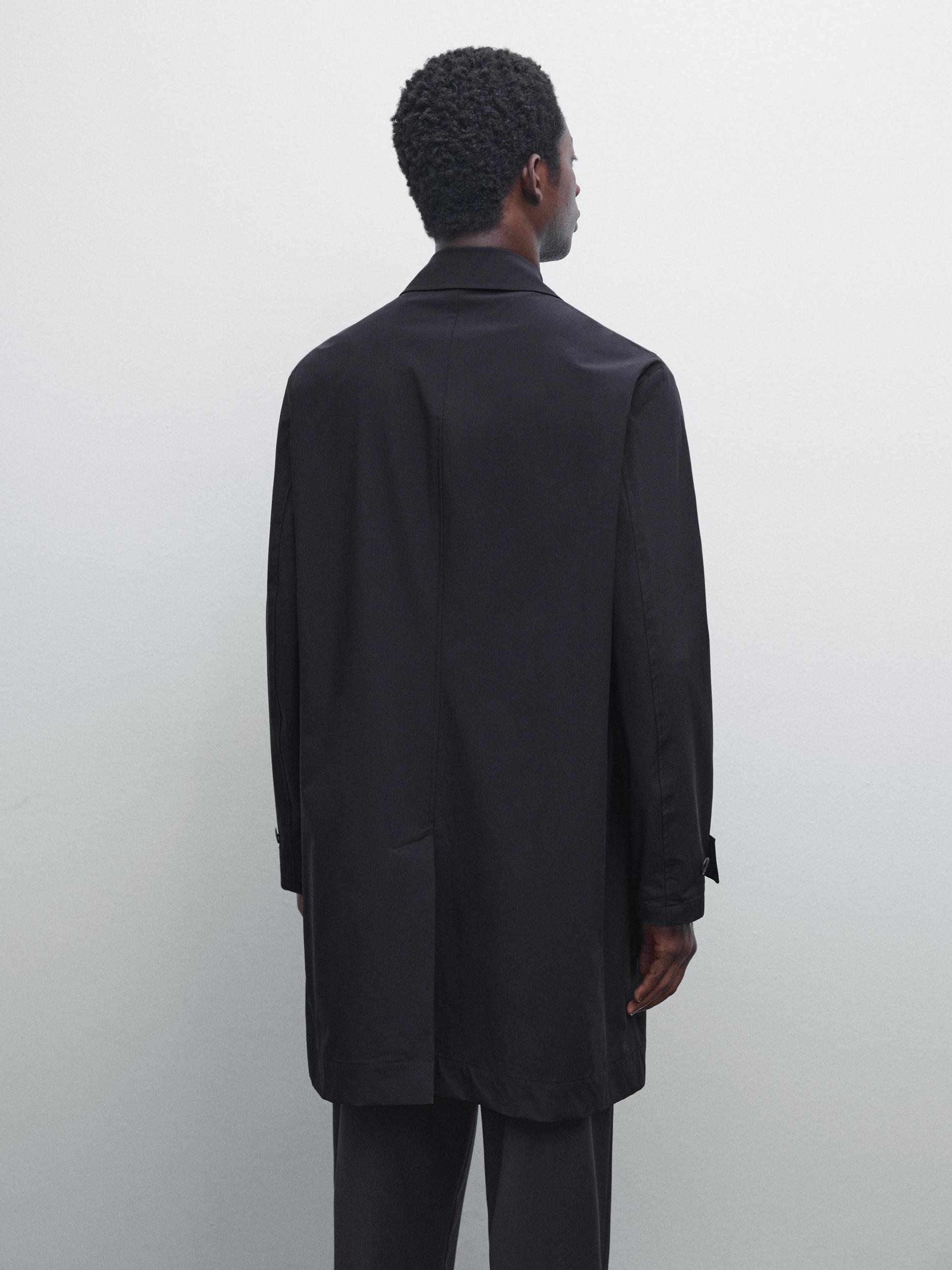 Lightweight trench coat with hidden buttons Product Image