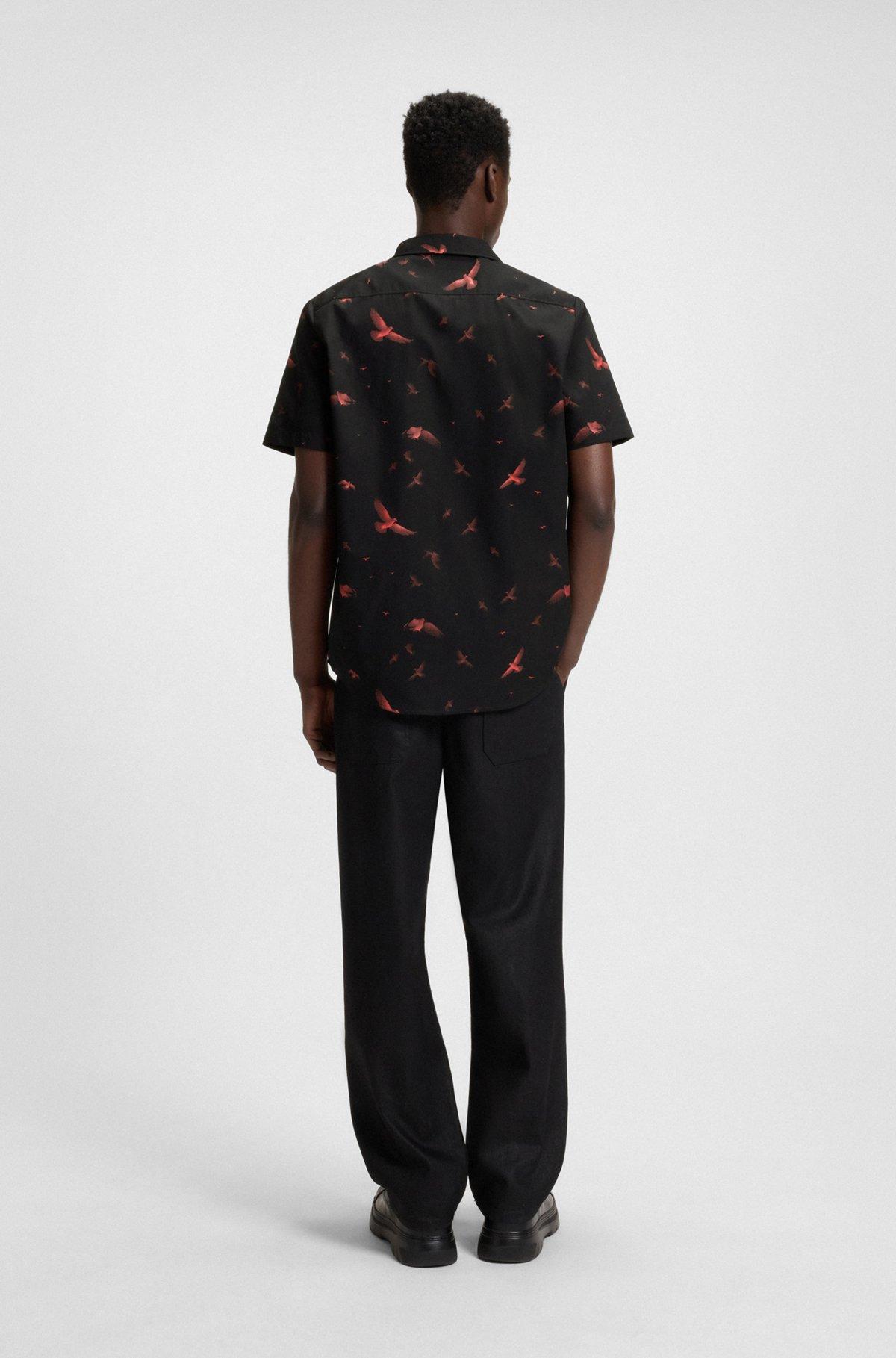 HUGO - Relaxed-fit shorts in printed cotton poplin - Black Product Image