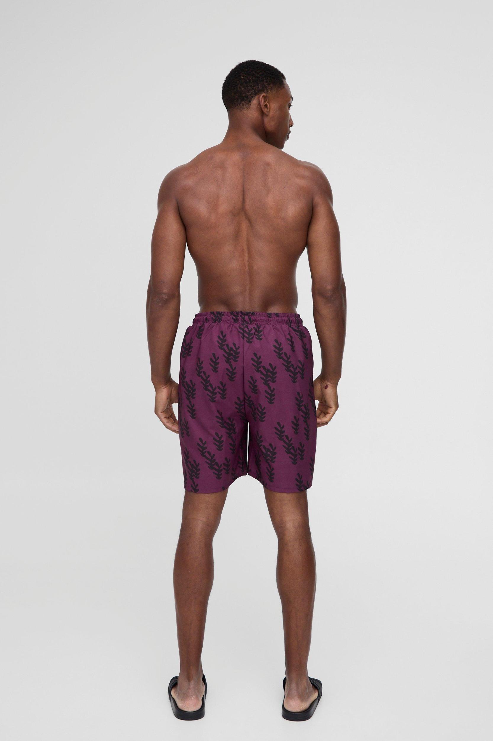 Regular Fit Mid Length Abstract Leaf Print Swim Trunks | boohooMAN USA Product Image