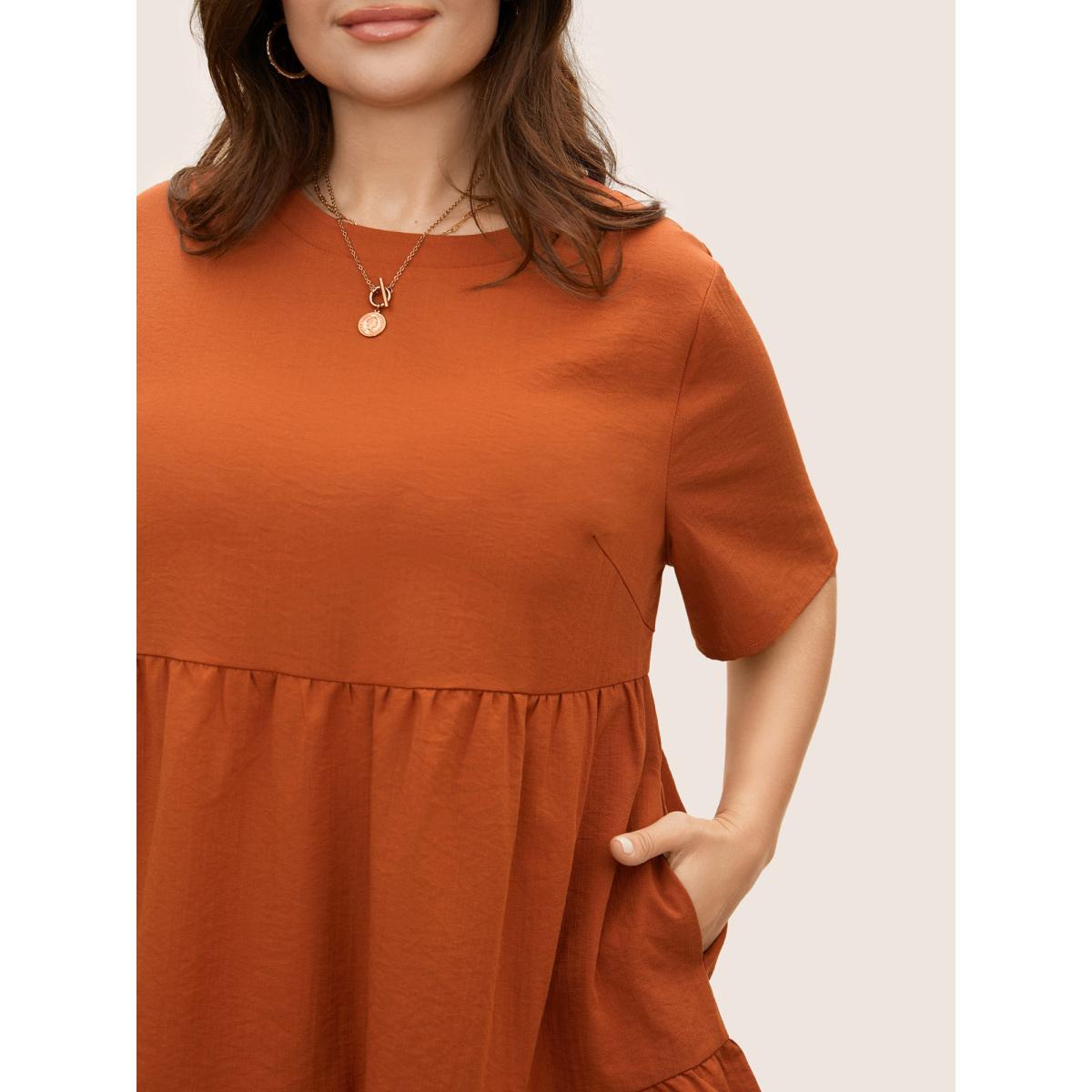 Plus Size Rust Solid Crew Neck Ruffle Hem Blouse Women Casual Short sleeve Round Neck Everyday Blouses BloomChic 12/L Product Image