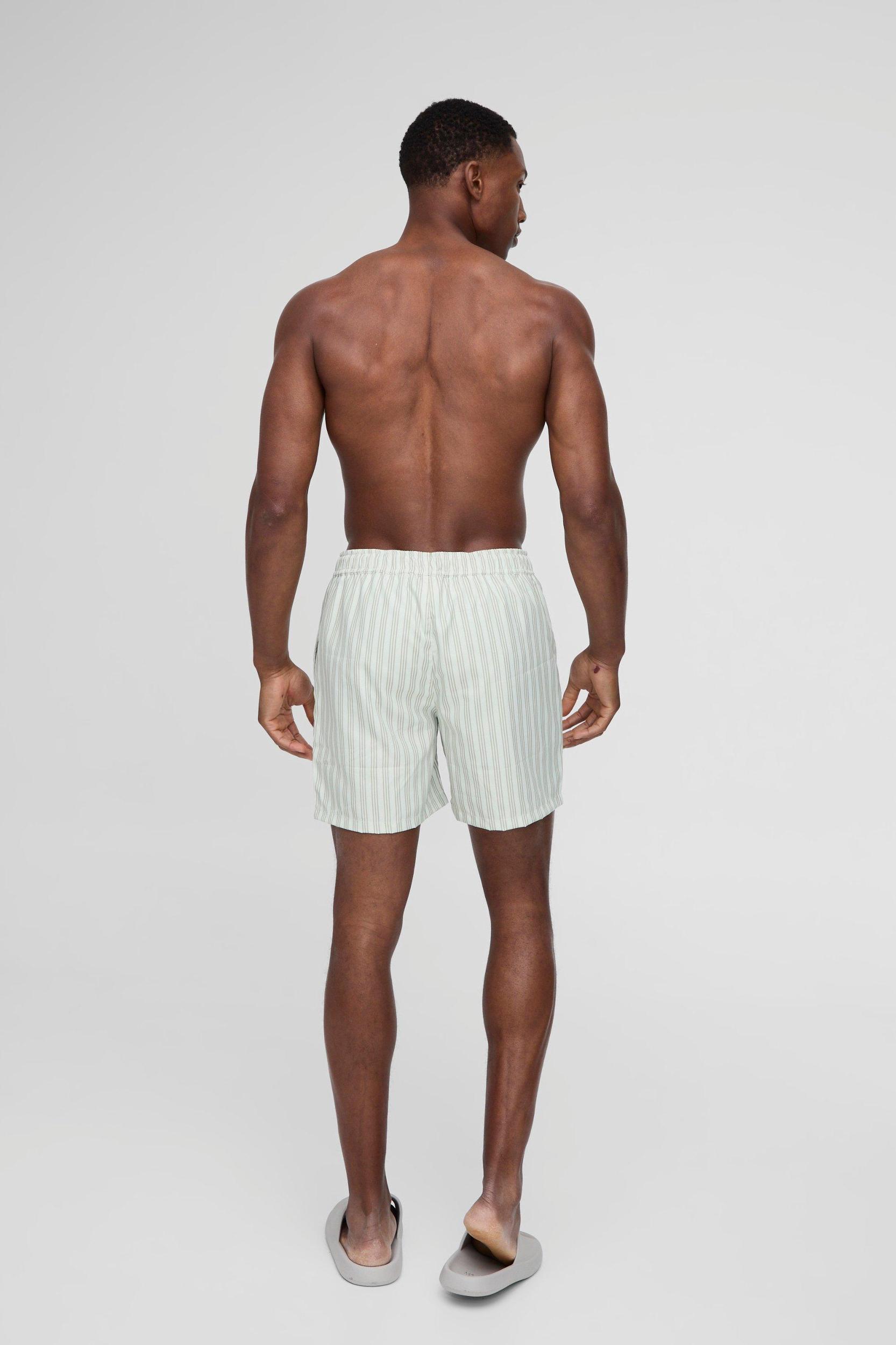 Mid Length Stripe Swim Trunks | boohooMAN USA Product Image