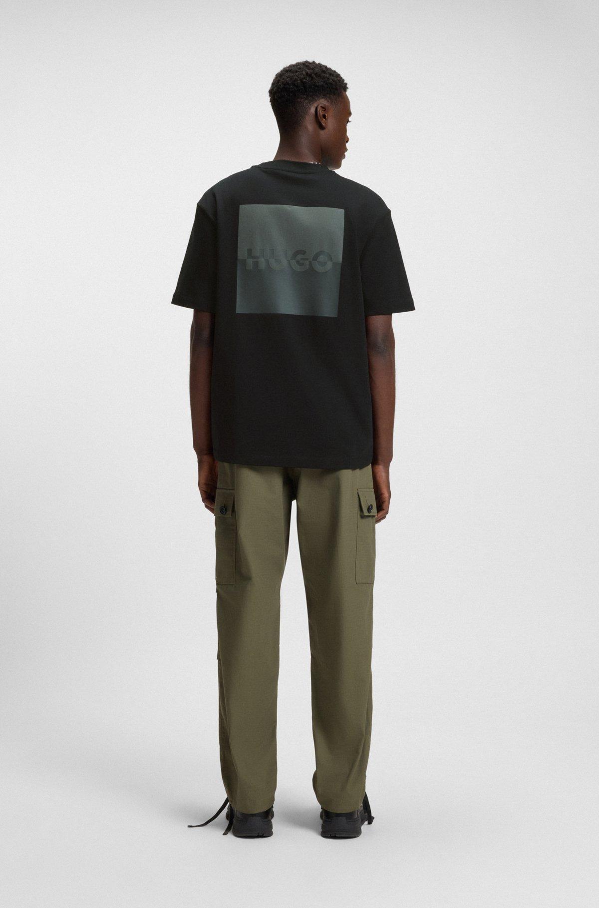 HUGO - Relaxed-fit T-shirt in cotton with split logos - Black Product Image