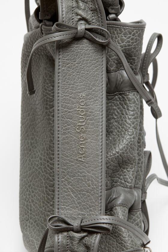 Multipocket grained leather bag Product Image
