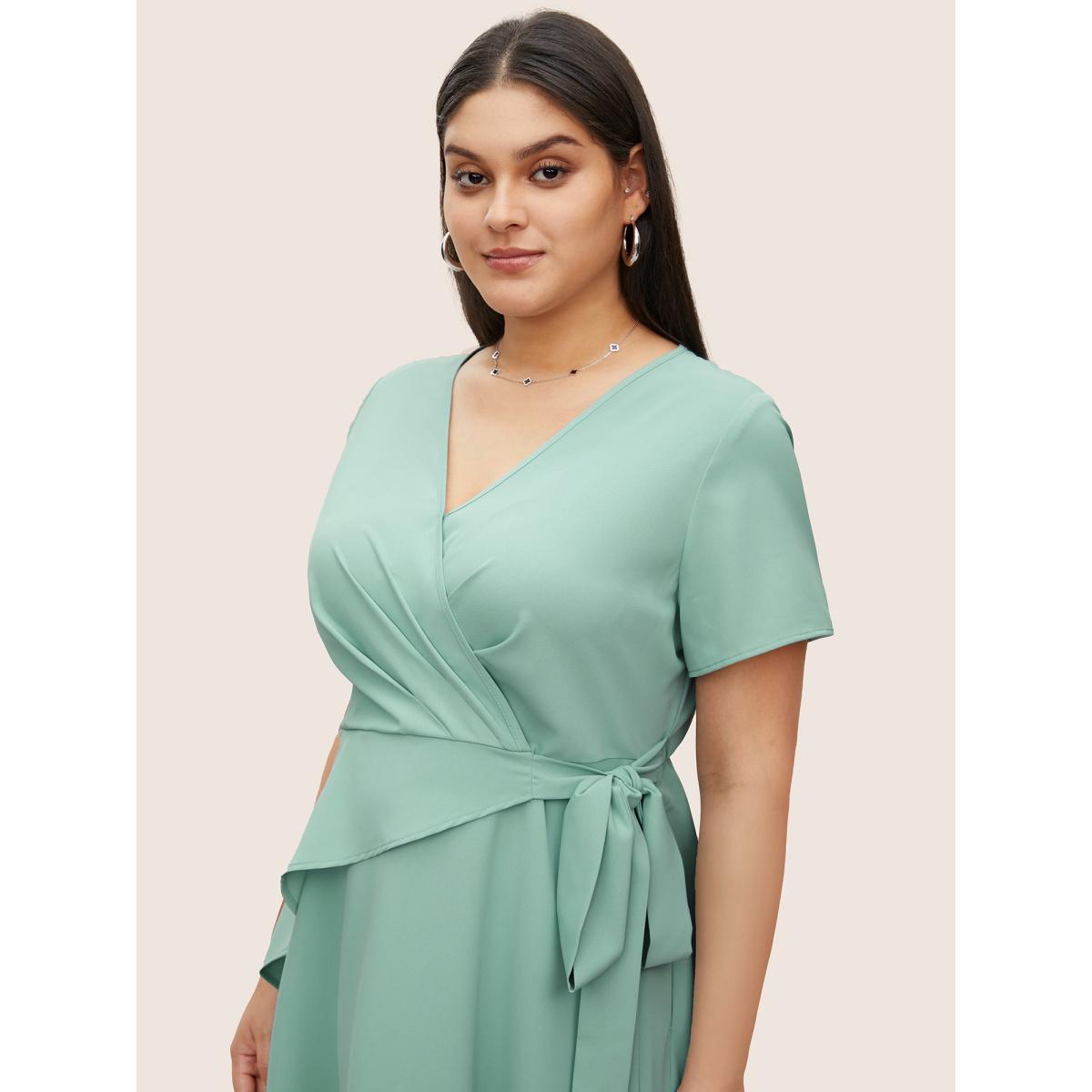 Plus Size Static-Free Overlap Collar Pleated Tie Knot Dress Mint Women At the Office Overlapping Overlap Collar Short sleeve Curvy Midi Dress BloomChic 26/4X Product Image